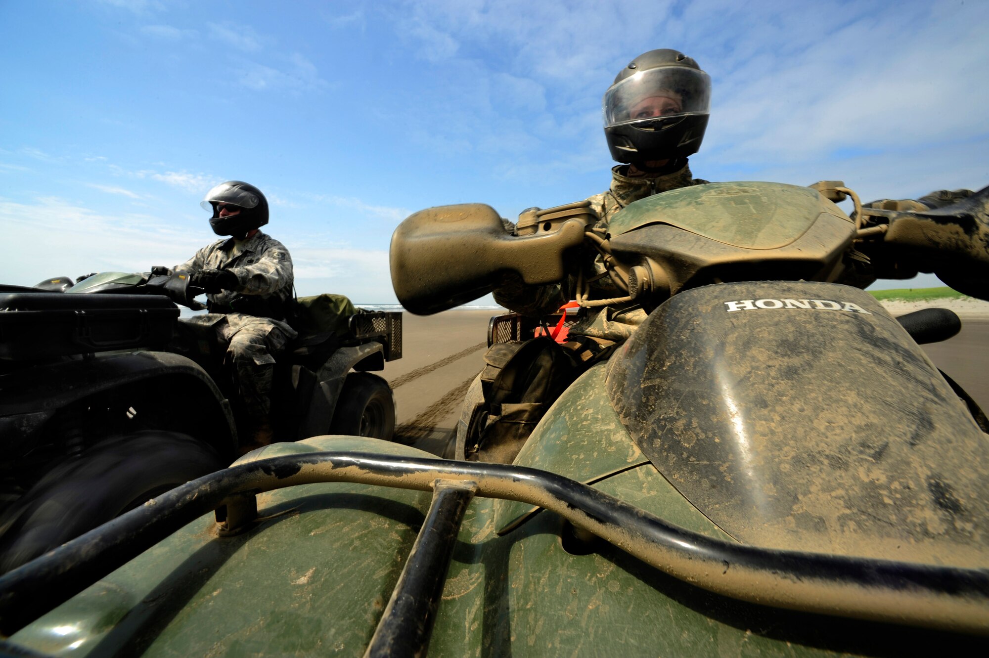 Tech. Sgt. Kirk Kauter (right) and Tech Sgt. Sean Potter, both from the 142nd Security Forces Squadron, Portland Air Base, Oregon, conduct a force protection patrol during Amalgam Dart 2009 at Camp Rilea, Oregon, June 14. Amalgam Dart is a field test of the Department of Defense's ability to rapidly deploy a total air integrated defense system in the U.S. in order to deter, detect and defeat airborne threats. (U.S. Air Force photo by Staff Sgt. Jacob N. Bailey)