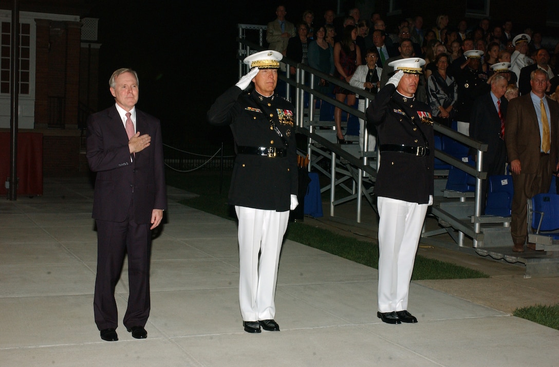 Ray Mabus, 75th Secretary of the Navy, stands for honors next to Gen. James T. Conway, 34th Commandant of the Marine Corps, and Col. Andrew H. Smith, Marine Barracks Washington commanding officer, during the Evening Parade at the Barracks, June 19.