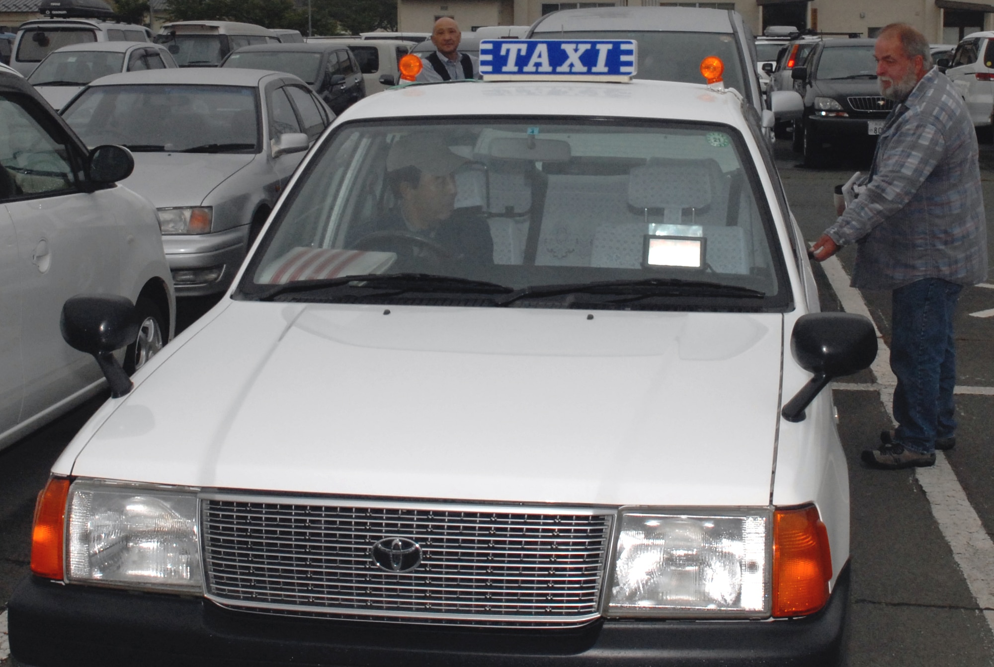 MISAWA AIR BASE, Japan – Many Misawa City taxi companies offer “daiko” service, meaning “to do for another,” where they will not only drop patrons at their homes, they will also drive their cars home, too. The Misawa Air Base taxi service, contracted by Army Air Force Exchange, expanded its daiko service to include Fridays. (Air Force photo/Staff Sgt. Phillip Butterfield) (Air Force photo/Staff Sgt. Phillip Butterfield)