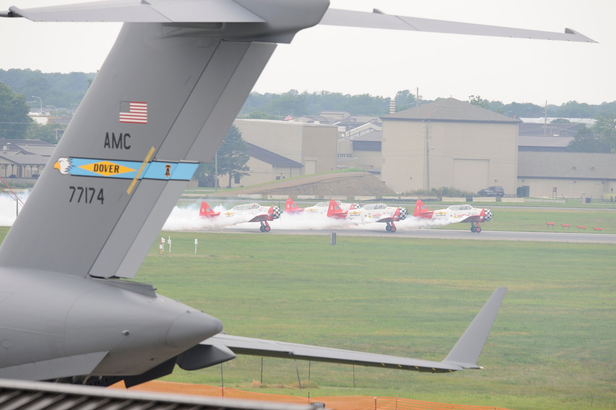 The Aeroshell Aerobatic Team take off to start their performance at the Dover Air Force Base Open House and Air Show June 21. (U.S. Air Force photo/Jason Minto)