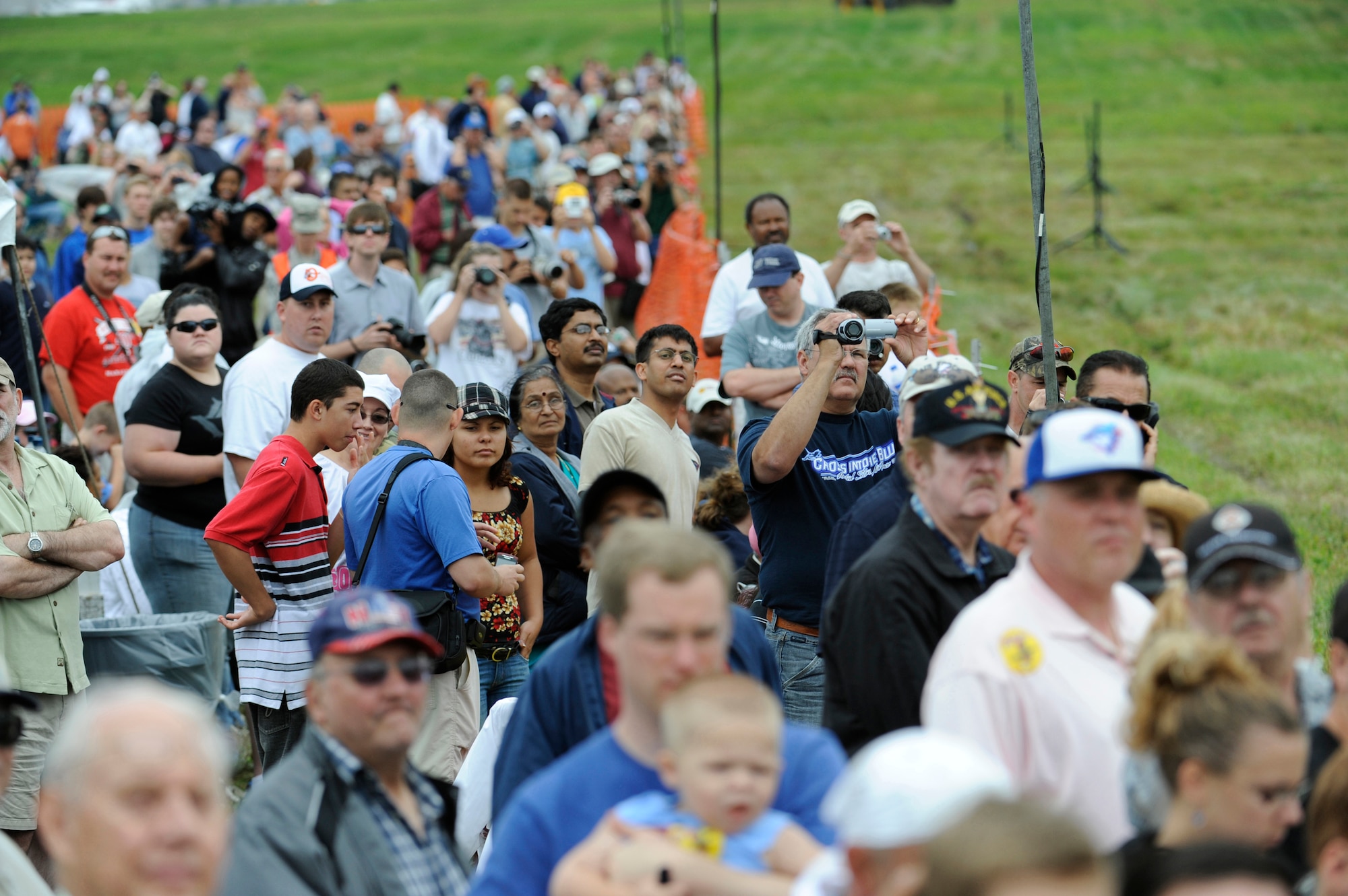 Crowds filled in for a spot to watch aerial performers June 21 at the Dover Air Force Base Open House. According to early estimates, approximately 75,000 spectators attended the 2009 Dover AFB Open House and Air Show. (U.S. Air Force photo/Jason Minto)
