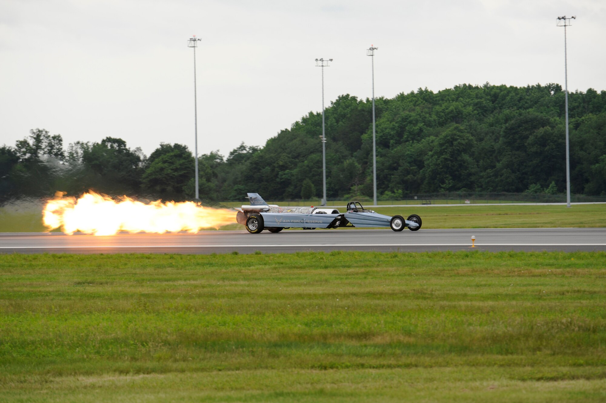 The Air Force Reserve jet car makes its way down the runway at the open house June 21. The car has a 10,000 horsepower jet engine originally from a T-2A aircraft. (U.S. Air Force photo/Jason Minto)