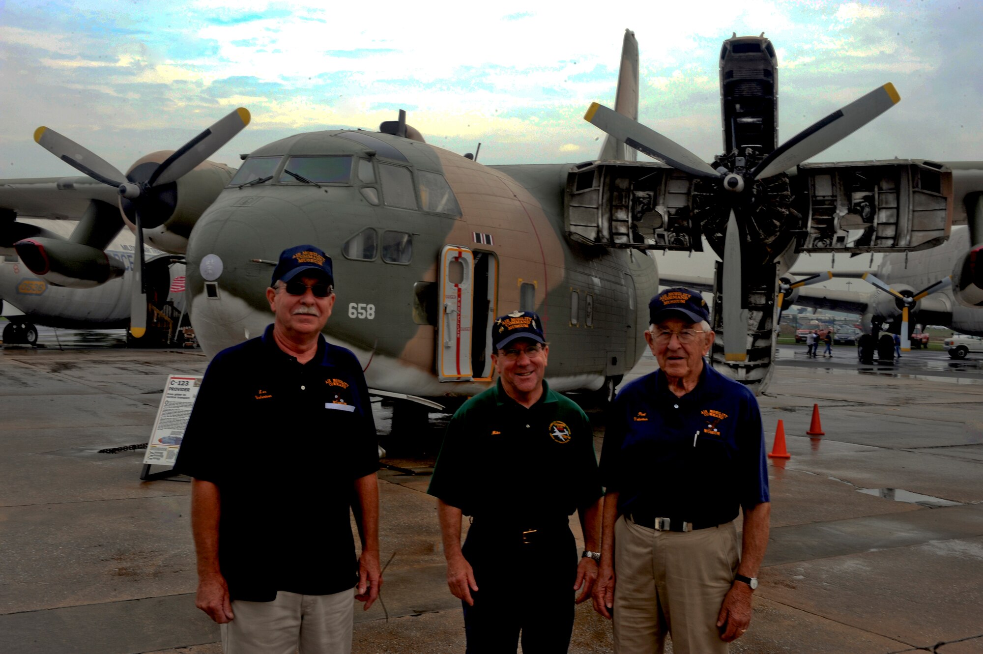 An Air Mobility Command Museum restoration crew recently finished a new engine display for a C-123, part of the museum's inventory. The new attraction made its debut at the 2009 Dover Air Force Base Open House and Air Show June 20-21. Restoration crew members pictured from left to right are Les Potter, Mike Phillips and Paul Mijal.