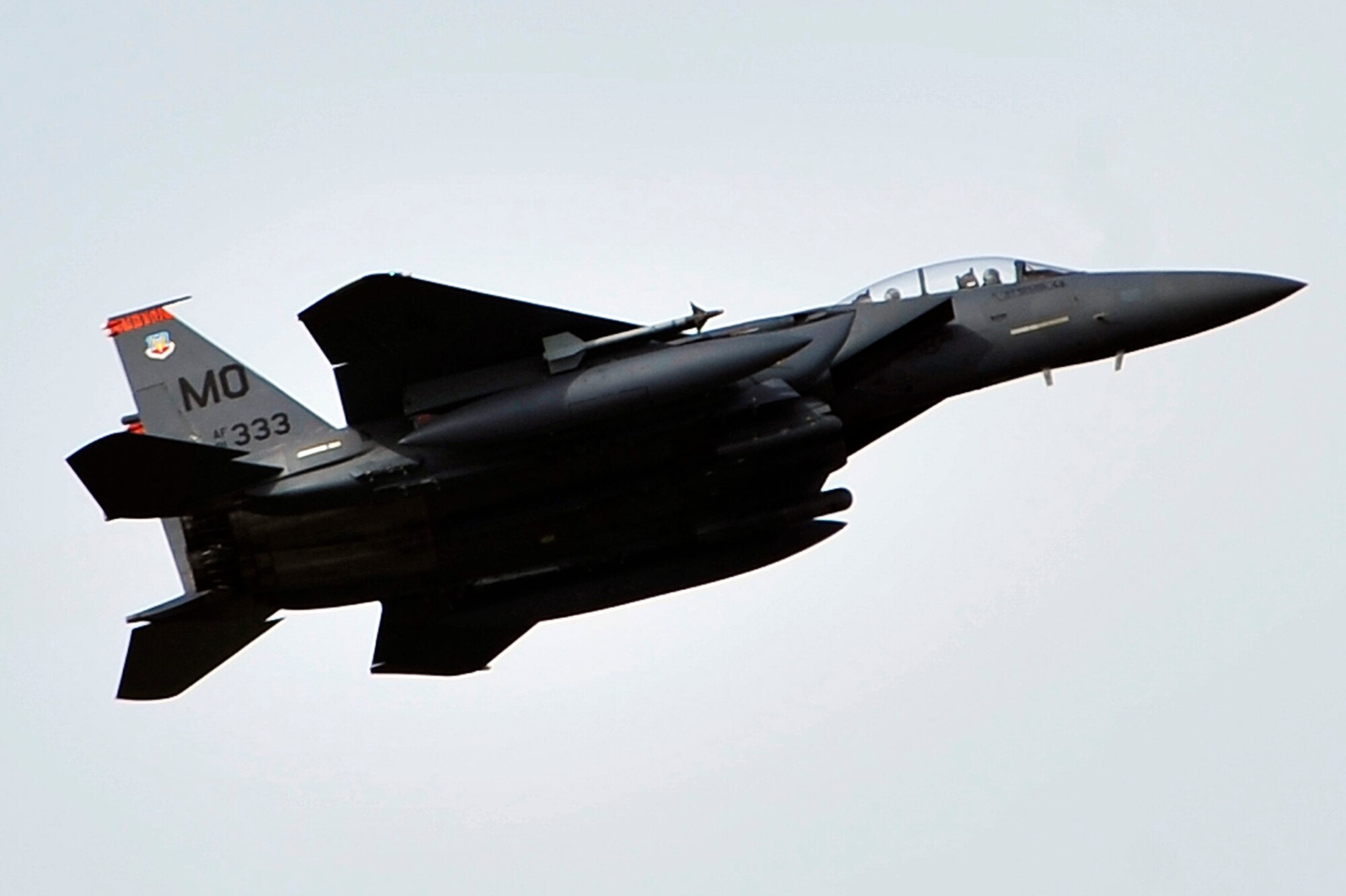 EIELSON AIR FORCE BASE, Alaska -- An F-15 Strike Eagle passes over Eielson AFB during NORTHERN EDGE 2009, June 22. NE09 is an exercise designed to sharpen the U.S. Armed Forces' skills and develop interoperable plans and programs. The F-15 is assigned to the 391st Fighter Squadron, Mountain Home AFB, Idaho. (U.S. Air Force photo/Staff Sgt. Christopher Boitz)