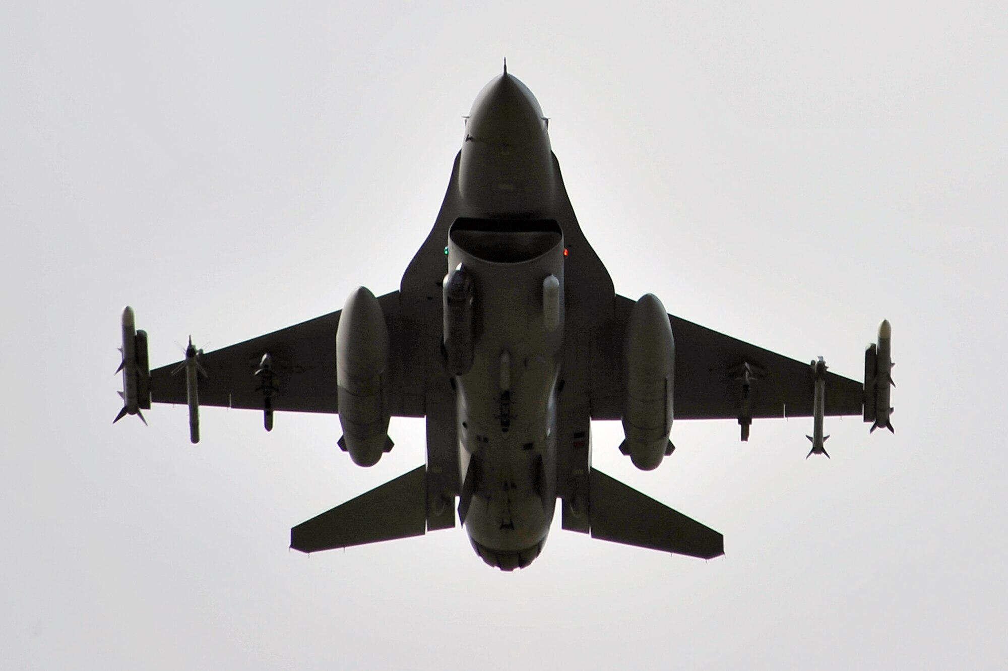 EIELSON AIR FORCE BASE, Alaska -- An F-16 passes over Eielson AFB during NORTHERN EDGE 2009, June 22. NE09 is one in a series of U.S. Pacific Command exercises that prepare joint forces to respond to crises in the region. (U.S. Air Force photo/Staff Sgt. Christopher Boitz)