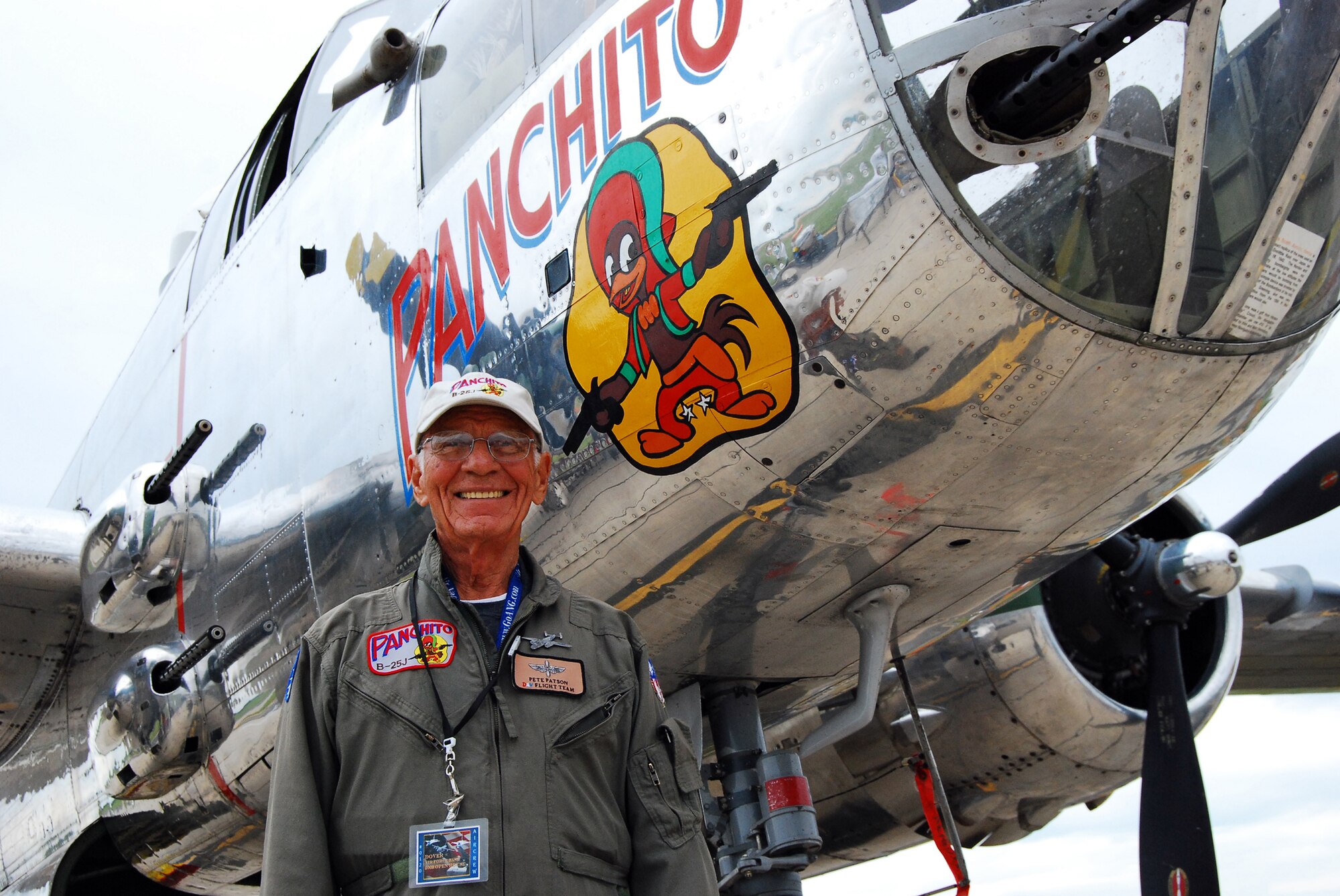 Crew Chief Pete Patson stands beside his Word War II era B-25J "Panchito".  The B-25J was one of several aircraft displays at the 2009 Dover Air Force Base Open House and Air Show. (U.S. Air Force photo/Staff Sgt. Steve Lewis)