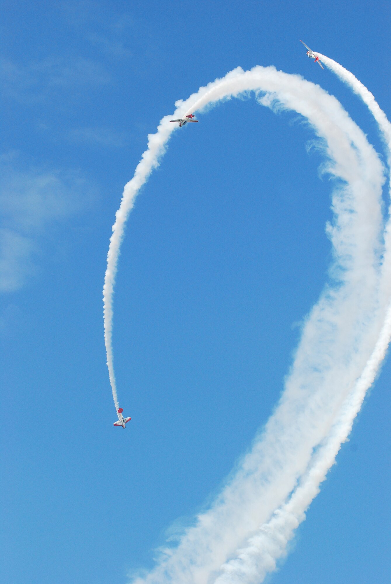 Stunt flying was one of several flying acts that took place during the 2009 Dover Air Force Base Open House and Air Show June 20-21.  Despite inclement weather, thousands of spectators arrived at Dover to see the flying acts and other static displays being showcased. (U.S. Air Force photo/Staff Sgt. Steve Lewis)  