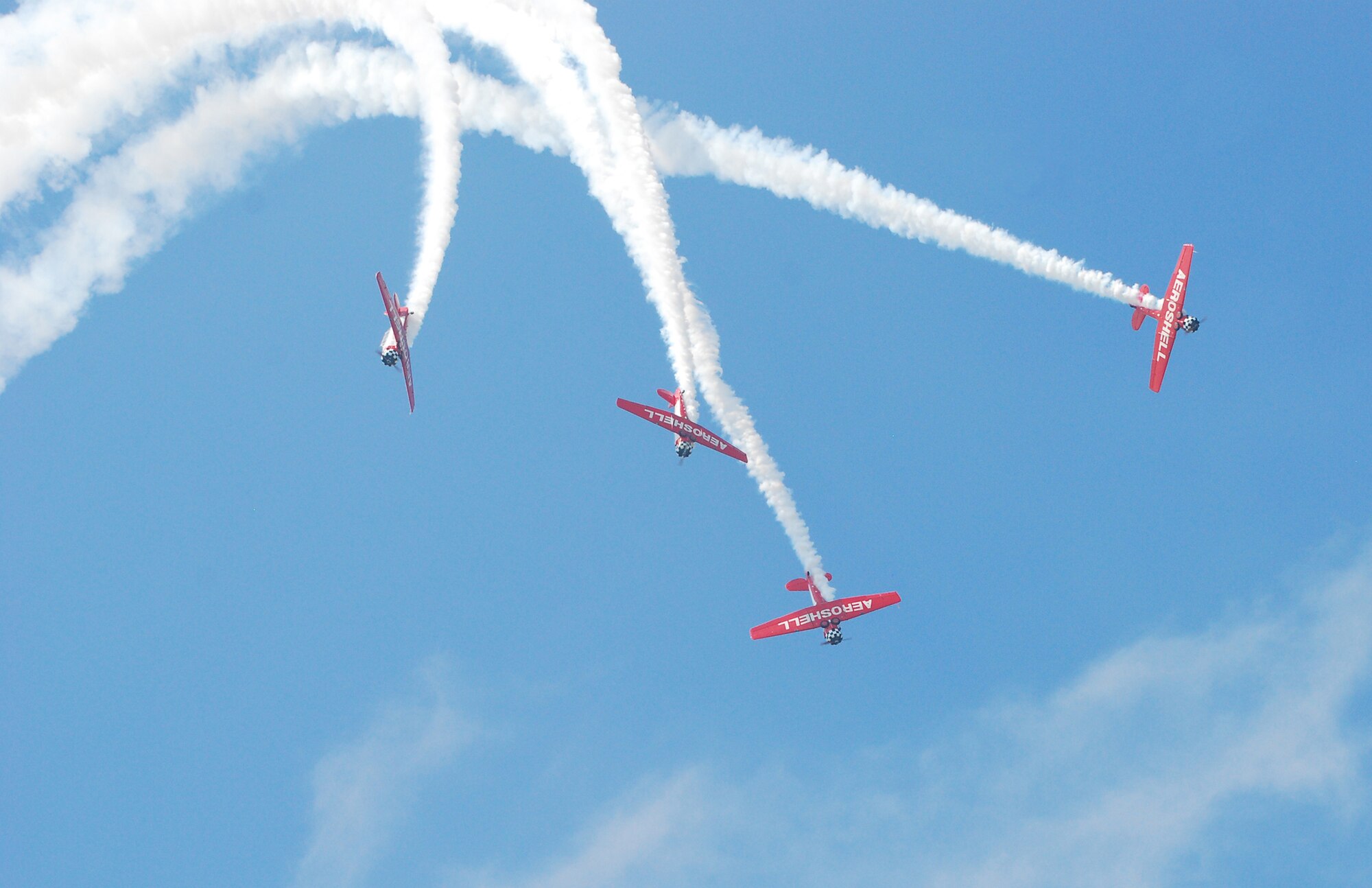 Stunt flying was one of several flying acts that took place during the 2009 Dover Air Force Base Open House and Air Show June 20-21. Despite inclement weather during the weekend event, thousands of spectators arrived at Dover to see the flying acts and other static displays being showcased. (U.S. Air Force photo/Staff Sgt. Steve Lewis)  