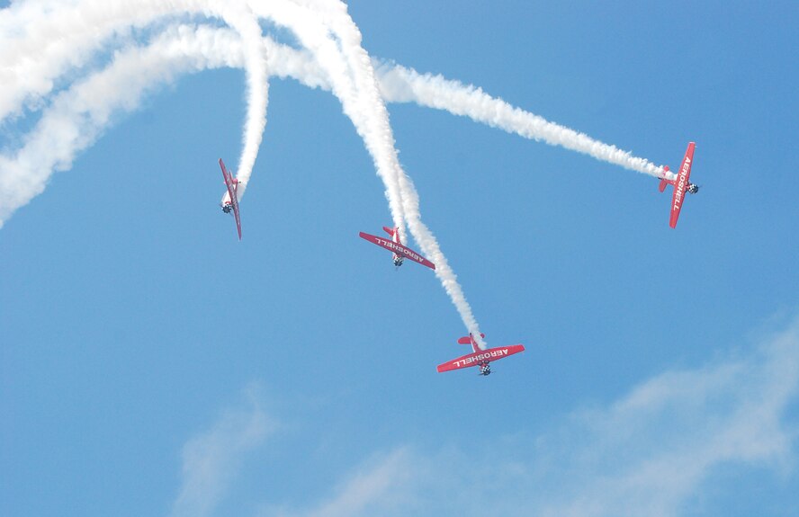 Stunt flying was one of several flying acts that took place during the 2009 Dover Air Force Base Open House and Air Show June 20-21. Despite inclement weather during the weekend event, thousands of spectators arrived at Dover to see the flying acts and other static displays being showcased. (U.S. Air Force photo/Staff Sgt. Steve Lewis)  