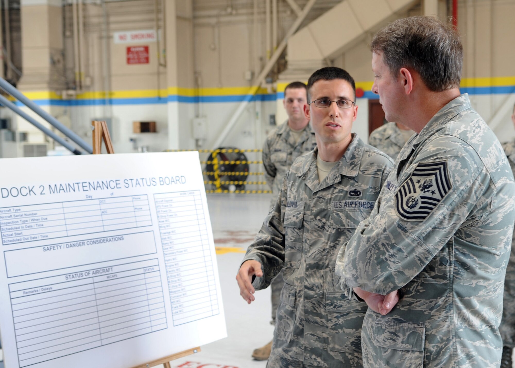 Staff Sgt. Justin Baldivia, 4th Equipment Maintenance Squadron, explains hydraulic purification capabilities for the F-15E Strike Eagle to Chief Master Sgt. of the Air Force Rodney McKinley on Seymour Johnson Air Force Base, June 12. Chief McKinley is the 15th CMSAF and serves as adviser to the Chief of Staff and the Secretary of the Air Force on issues regarding the enlisted force. (U.S. Air Force photo/Senior Airman Makenzie Lang) 
