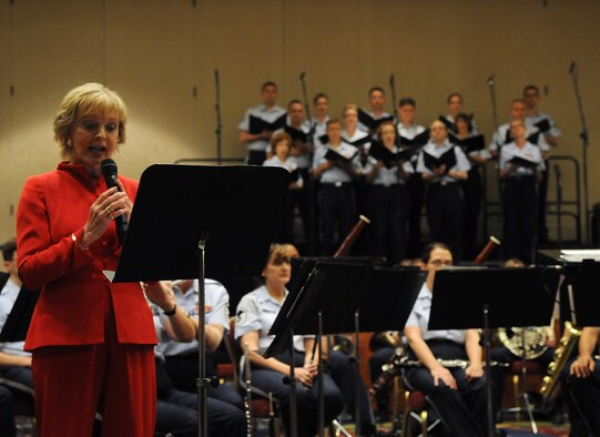 Guest emcee Florence Henderson narrates a concert June 19 at the Arlington Ballroom of the Crystal Gateway Marriott in Arlington, Va. The concert featured the Concert Band and Singing Sergeants along with select student musicians, as part of the Band’s Summer Concert Series. (U.S. Air Force photo by Senior Airman Marleah Miller)