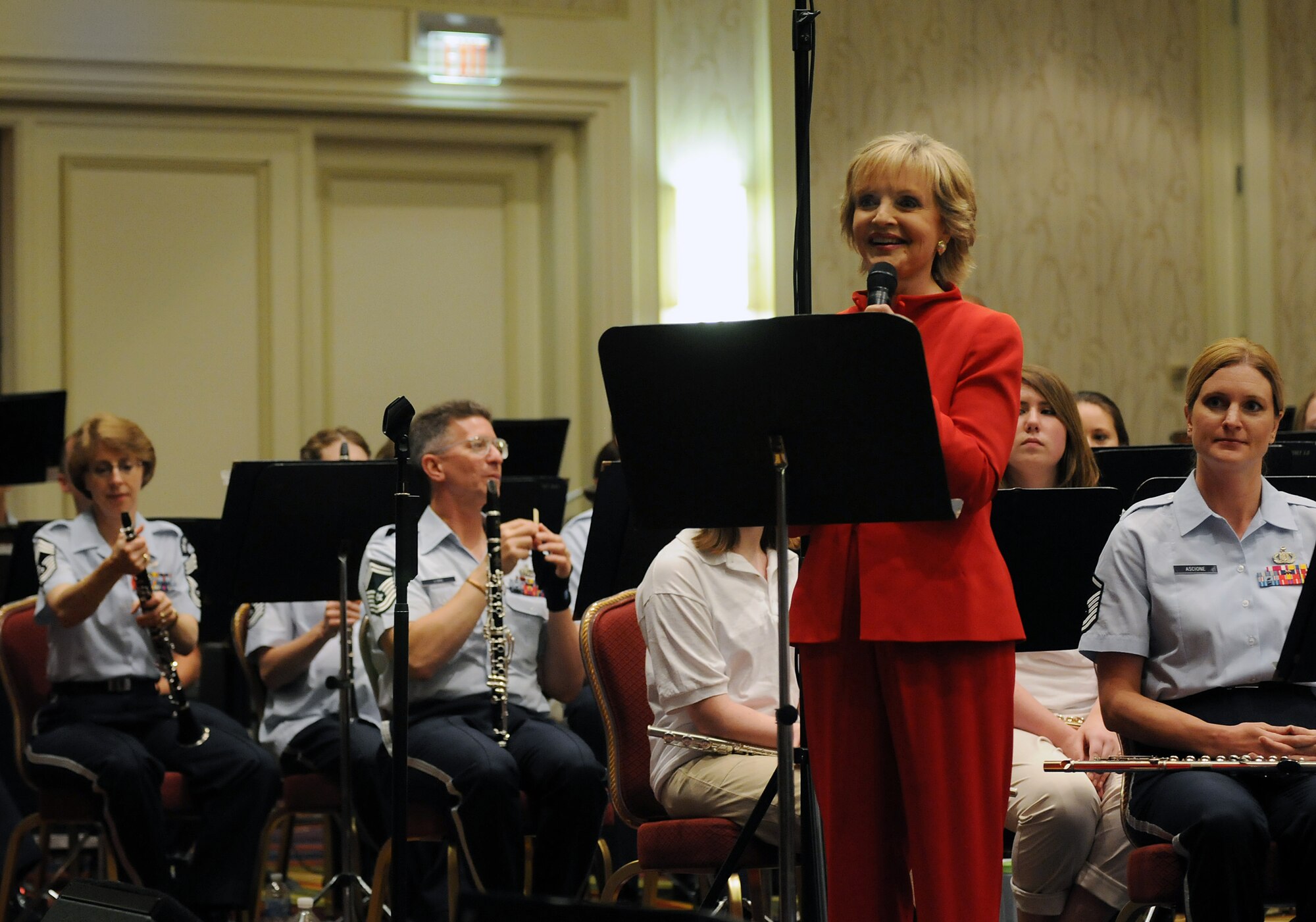 Guest emcee Florence Henderson speaks during a concert June 19 at the Arlington Ballroom of the Crystal Gateway Marriott in Arlington, Va. Each of the Band’s performing ensembles presents outdoor concerts as part of their Summer Concert Series at the United States Air Force Memorial on Wednesdays and Fridays throughout the summer. (U.S. Air Force photo by Senior Airman Marleah Miller)