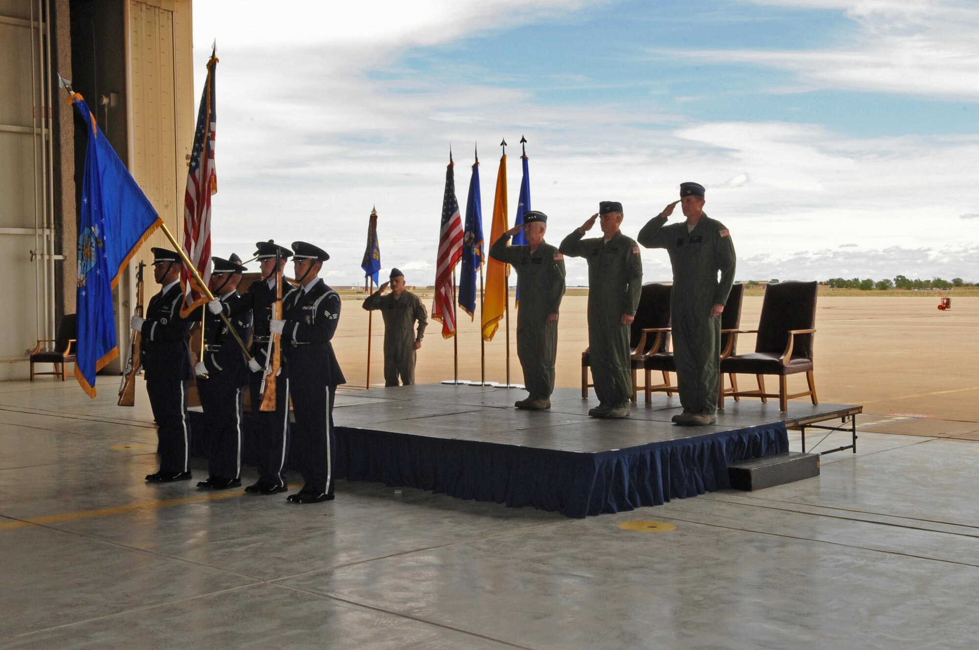 CANNON AFB, N.M.?The 27th Special Operations Wing Honor Guard presents the colors during the playing of the national anthem during the 16th Special Operations Squadron flag-transfer ceremony here June 19.  The 16 SOS flies the AC-130H Spectre gunship and conducts missions such as close air support to defend friendly forces on the ground, air interdiction against preplanned targets or targets of opportunity and force protection, such as defending air bases or facilities. (U.S. Air Force photo by Staff Sgt. Heather R. Redman/RELEASED)