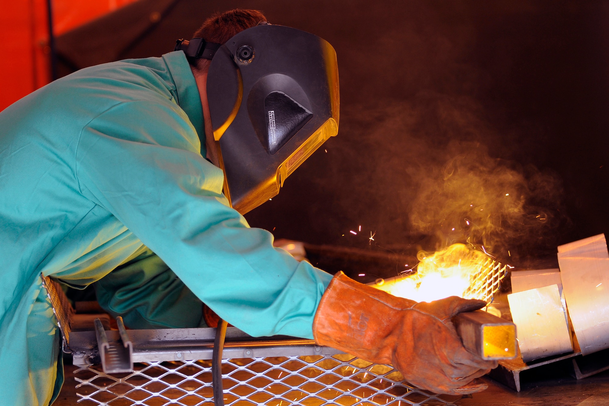 A Field Engineering and Readiness Laboratory cadet practices welding on a FERL flight project at the U.S. Air Force Academy June 5. The FERL program is mandatory for cadets majoring in civil engineering. (U.S. Air Force photo/Dave Ahlschwede)