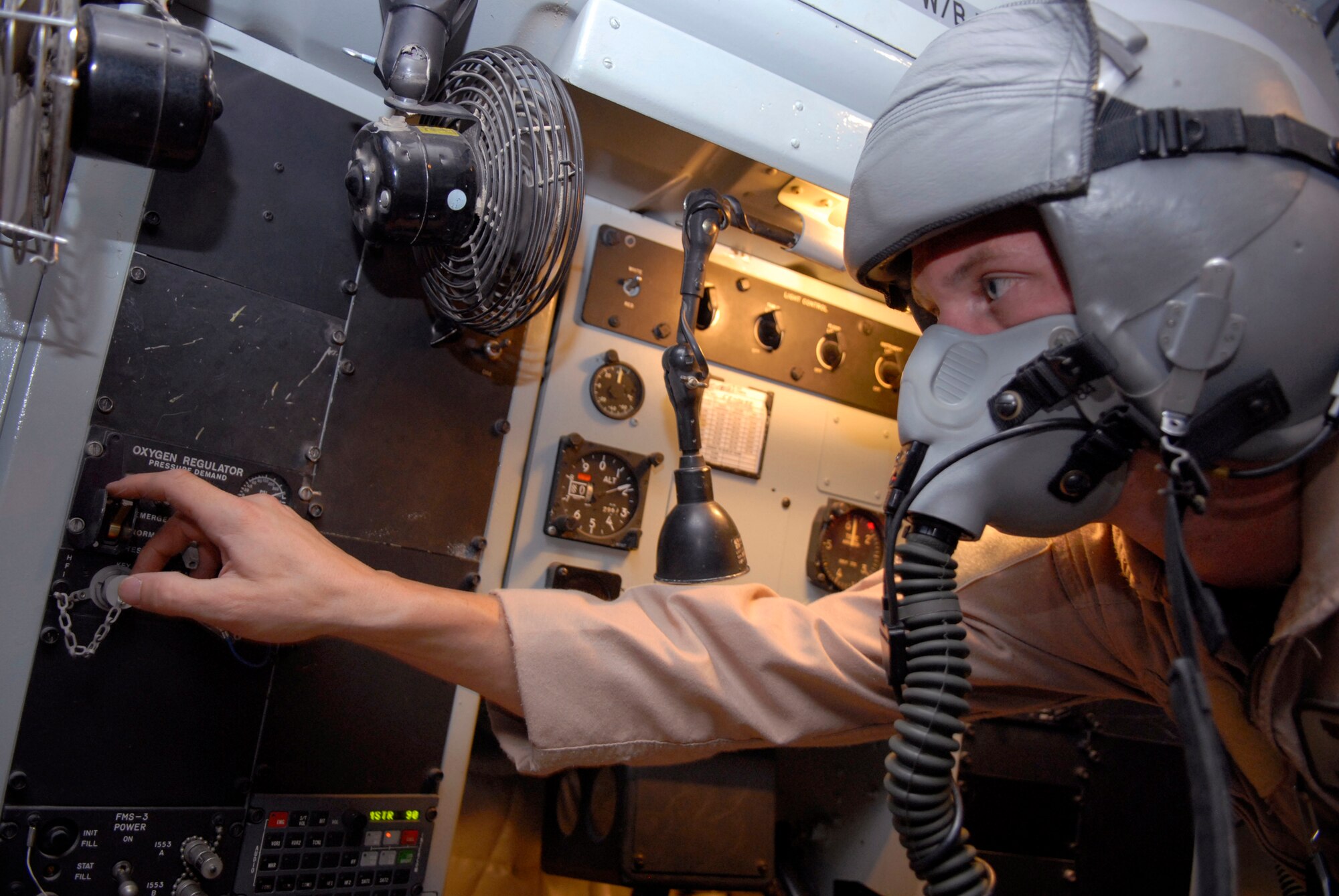 Tech. Sgt. Jake Way, a 340th Expeditionary Air Refueling Sqadron boom operator, performs a preflight check on an oxygen regulator before another mission in a KC-135R Stratotanker, June 21, 2009, at an undisclosed location in Southwest Asia. The KC-135R aircrews support combat operations by performing inflight refueling for combat aircraft supporting servicemembers in operations on the ground in the U.S. Central Command's area of responsibility.  Sergeant Way hails from Meridian, Miss. and is deployed from the 186th Air Refueling Wing, Miss. Air National Guard, in support of Operations Iraqi and Enduring Freedom and Combined Joint Task Force - Horn of Africa.  (U.S. Air Force photo/Senior Airman Andrew Satran/released)