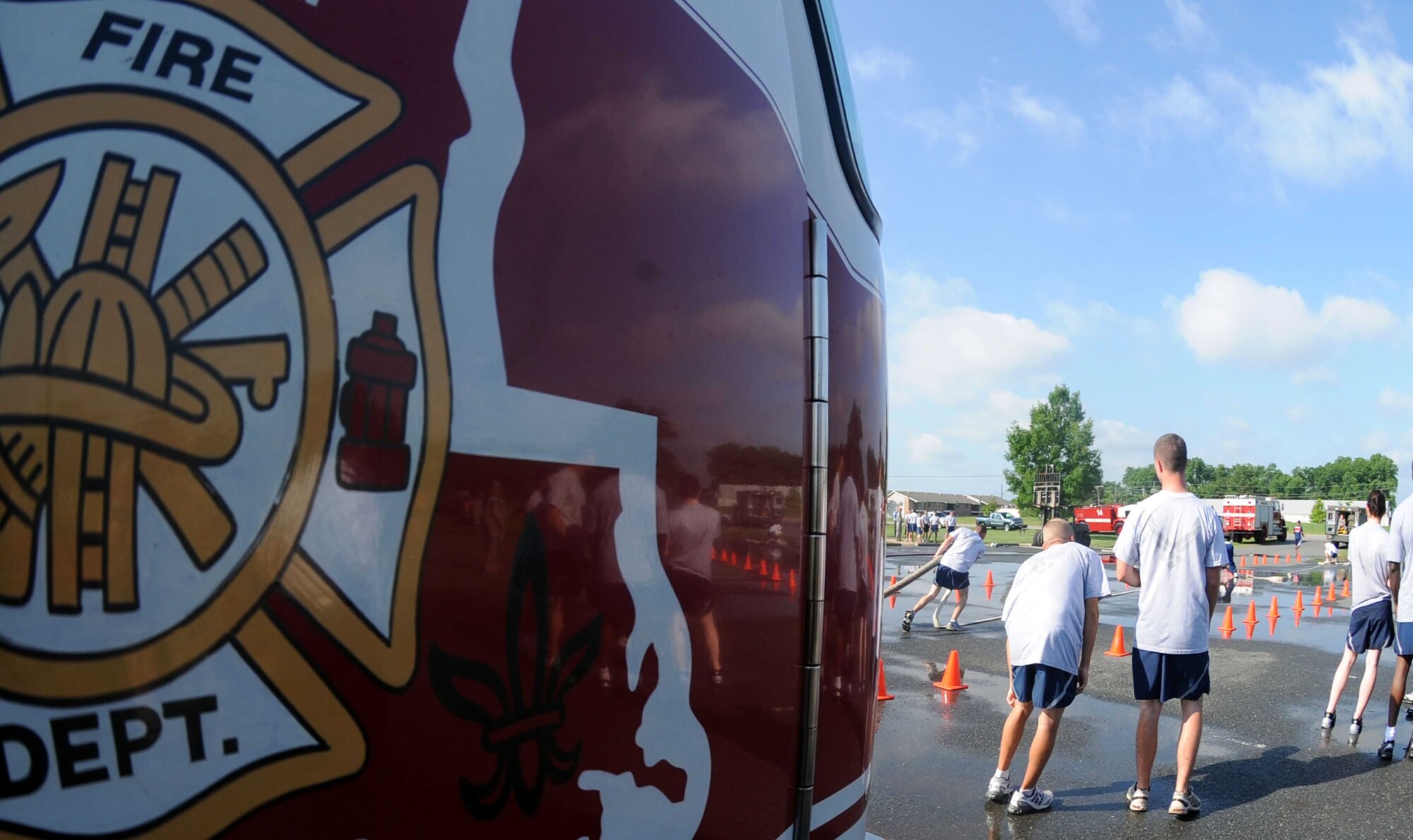 BARKSDALE AIR FORCE BASE, La. -- Airmen from the Mission Support Group participate in Barksdale’s annual Fire Muster June 12. A fire muster is a fire department competition consisting of several events. These activities resemble training the Air Force firefighters use to keep their lifesaving skills sharp. (U.S. photo/Airman 1st Class Brittany Y. Bateman)
