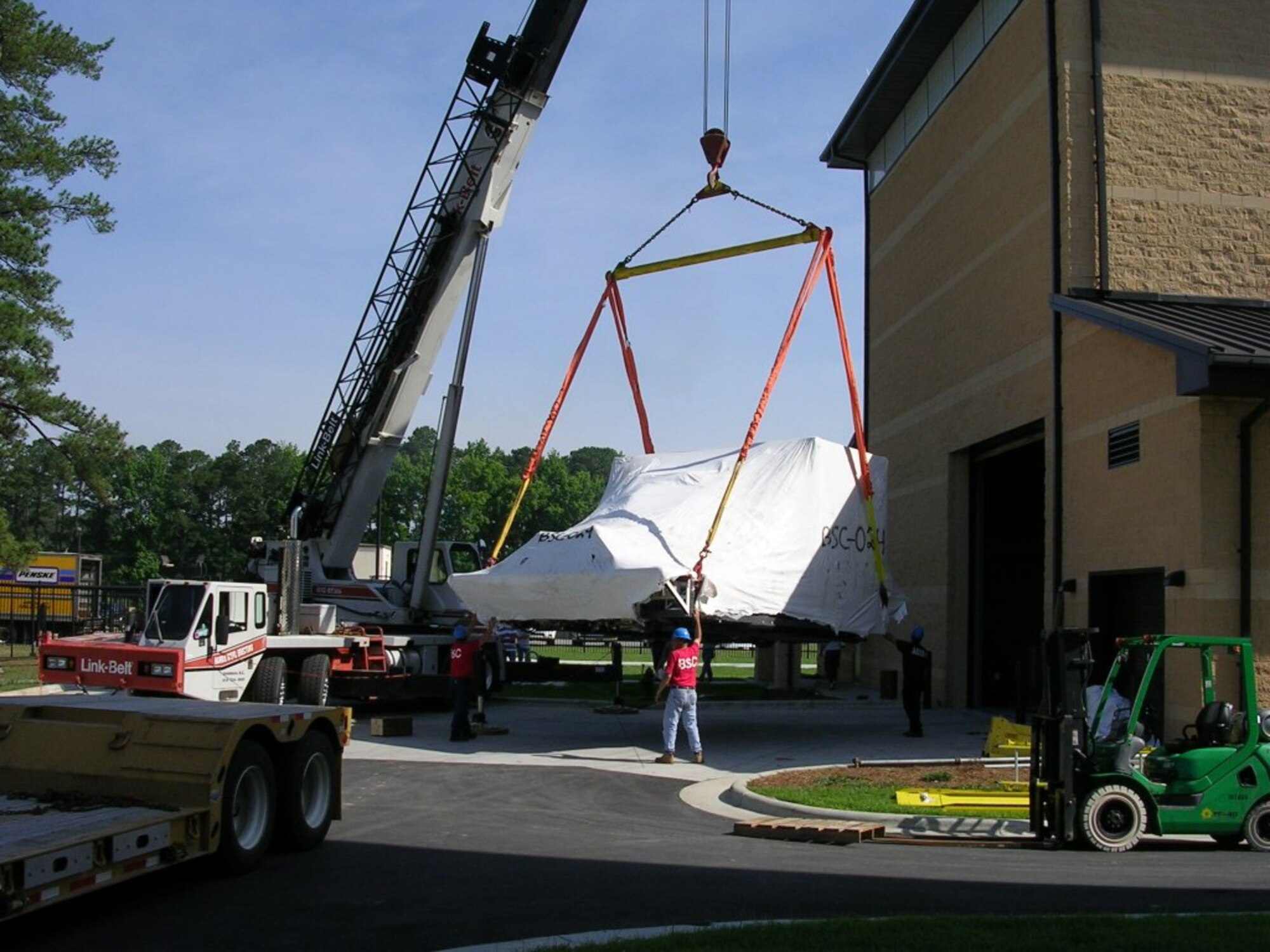 SEYMOUR JOHNSON AIR FORCE BASE, N.C. -- The 916th Air Refueling Wing, Air Force Reserve, received its KC-135 simulator from Meridian, Miss. on June 19. The simulator weighs 22,800 pounds and was positioned into the new 916th Squadron Operations Building, which is planned to open on Aug. 14 after an official ribbon-cutting ceremony. (U.S. Air Force photo by: 1Lt. David Ramirez)