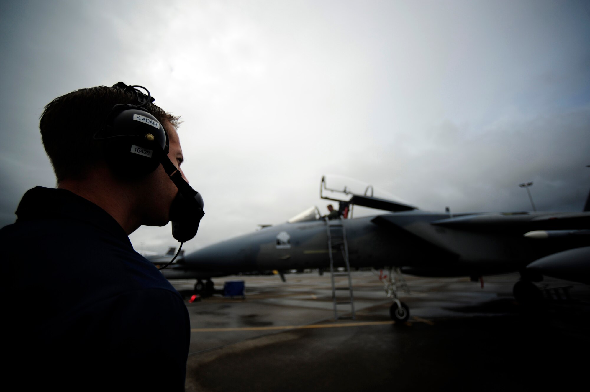 U.S. Air Force Staff Sgt. Kyle Adair, an F-15 Eagle crew chief, 142nd Fighter Wing, Portland Air National Guard Base, Ore., prepares to launch an aircraft in support of Amalgam Dart 2009, June 19. Amalgam Dart is a field test of the Department of Defense's ability to rapidly deploy a total air integrated defense system in the U.S. in order to deter, detect and defeat airborne threats. (U.S. Air Force photo by Staff Sgt. Jacob N. Bailey)