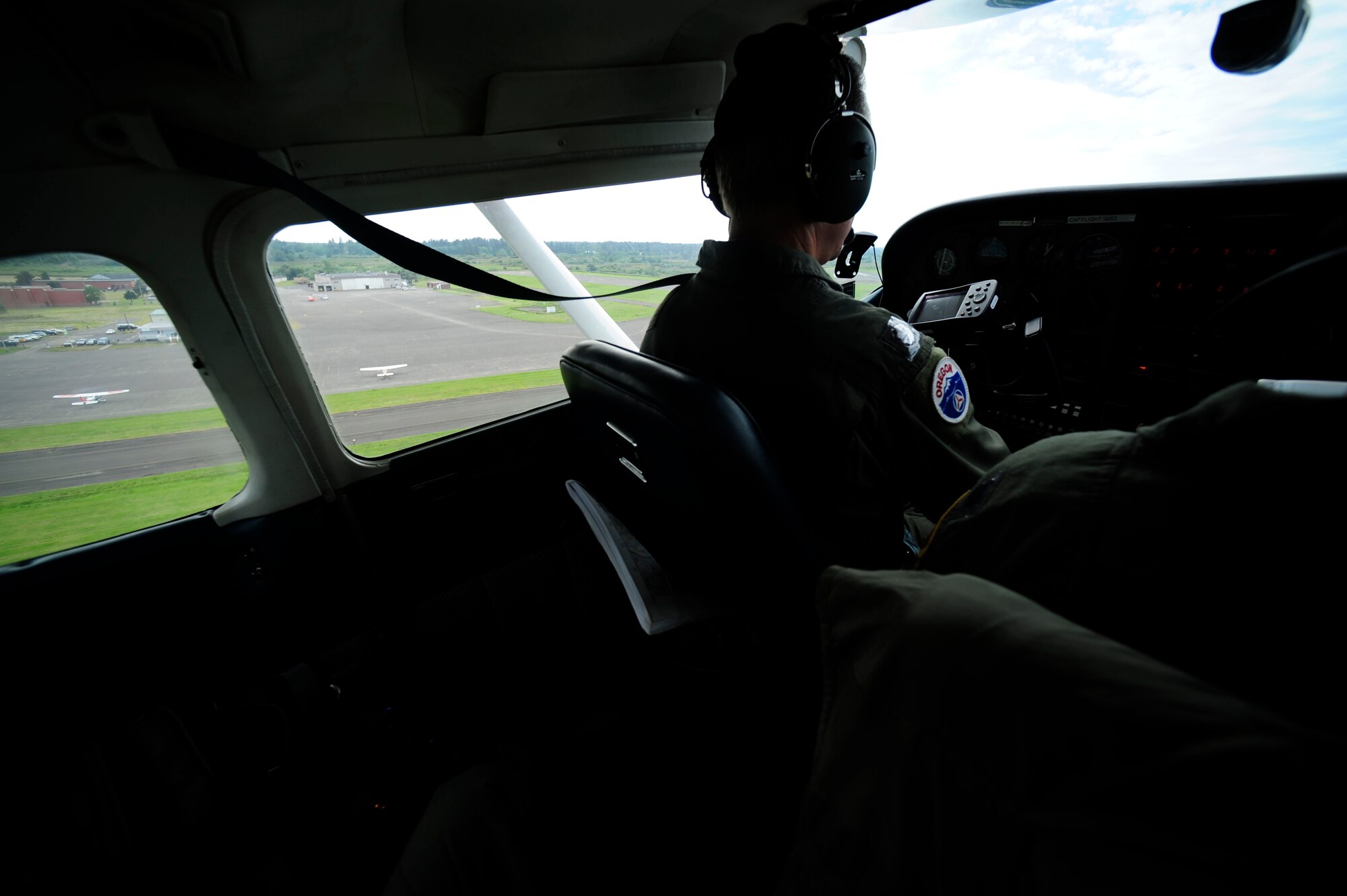 Lt. Col. Wayne Schulz, U.S. Air Force Auxiliary, Civil Air Patrol, takes off in a C-182 Cessna from Astoria, Ore. during Amalgam Dart 2009, June 18. Amalgam Dart is a field test of the Department of Defense's ability to rapidly deploy a total air integrated defense system in the U.S. in order to deter, detect and defeat airborne threats. (U.S. Air Force photo by Staff Sgt. Jacob N. Bailey)