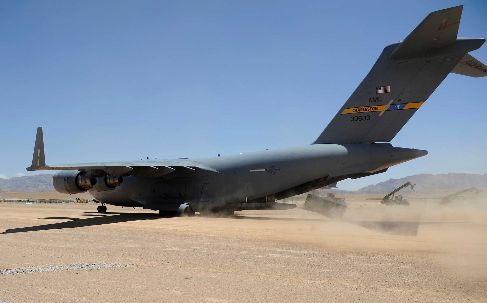 A pallet is combat offloaded from a C-17 Globemaster III June 20, at Tarin Kowt Airfield, Afghanistan. Members of the 816th Expeditionary Airlift Squadron conducted a combat offload. (U.S. Air Force photo/Staff Sgt. Shawn Weismiller)