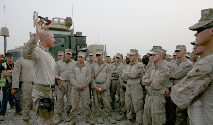 2nd Lt. Marc A. Hunter, platoon commander, Transportation Support Company, 2nd Supply Battalion, 2nd Marine Logistics Group (Forward), briefs his platoon on the scheme of maneuver for their convoy departing from Joint Base Balad to Camp Al Taqaddum, Iraq, June 22, 2009. All convoy operators within the MLG (Fwd) received valuable training on the importance of getting a full eight hours of sleep before conducting convoys.
