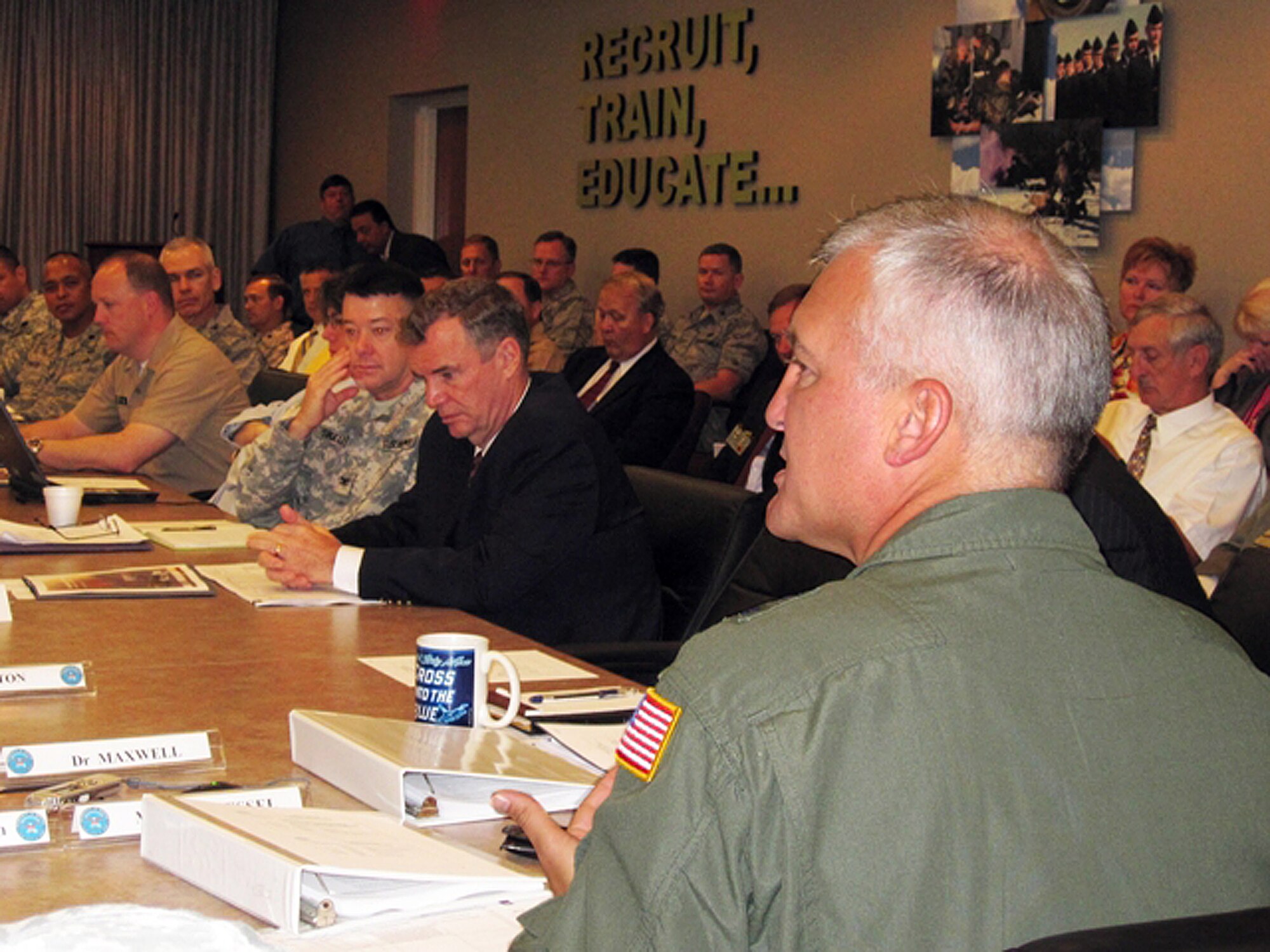 Maj. Gen. Erwin F. Lessel III, Director of Plans, Programs, Requirements and
Assessments at Air Education and Training Command (AETC)/A5/8/9 listens as joint basing leaders work to solve problems during the memorandum of agreement (MOA) review workshop June 9-11 at Randolph Air Force Base, Texas. AETC hosted the workshop. (U.S. Air Force photo/Ron Rogers)
