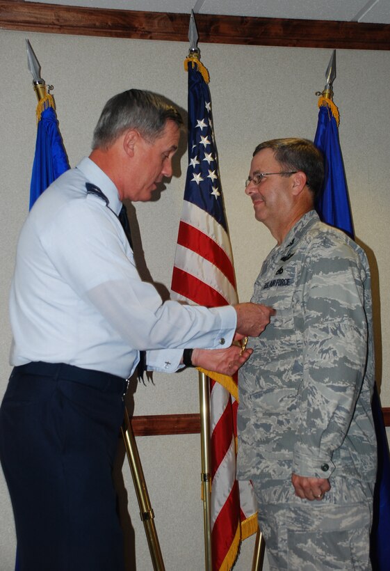 Brig. Gen. O.G. Mannon (left), 82nd Training Wing commander, pins the Legion of Merit medal on former wing Vice Commander Col. David Norsworthy June 19 in the wing conference room. Colonel Norworthy left Sheppard recently to work at Air Education and Training Command. Col. Michael Hake will serve as the wing's new vice commander. (U.S. Air Force photo/John Ingle)
