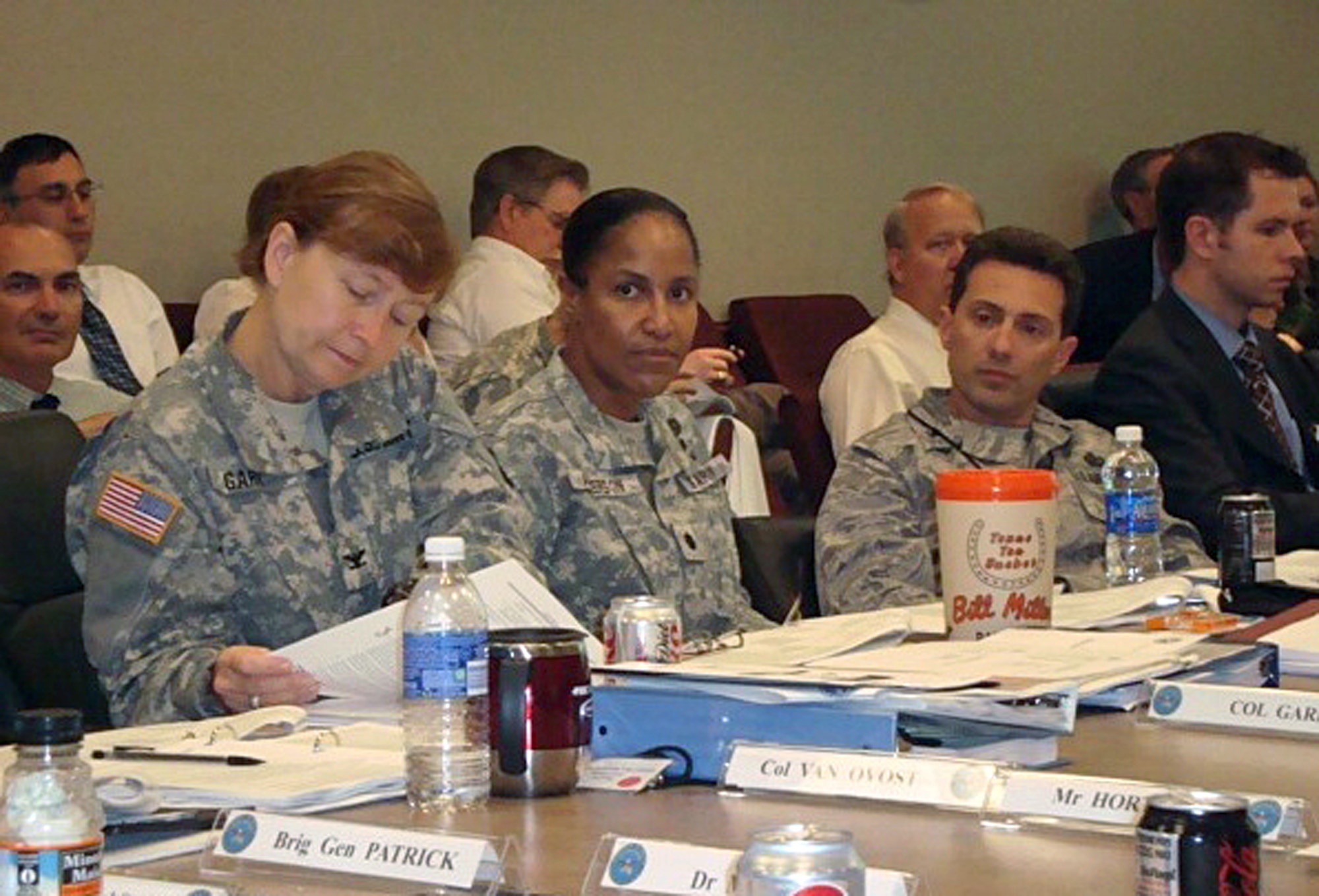 Fort Sam Houston Garrison Commander Col. Mary Garr (left) helps work out details during the memorandum of agreement (MOA) review workshop June 9-11 at Randolph Air Force Base, Texas. Air Education and Training Command (AETC) hosted the workshop. (U.S. Air Force photo/Ron Rogers