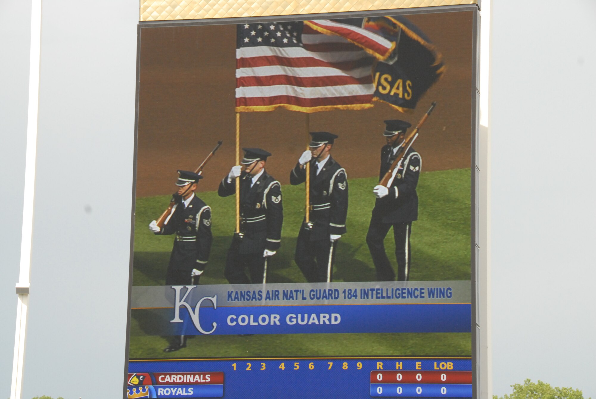 062009-F-6174J-010- (l-r) SSgt Francis Nguyen, SSgt Jason Harkness, SSgt Aaron Santry, and SrA Byron Smith present the colors at the Kansas City Royals game at Kaufman Stadium on June 20, 2009. Video of the 184th Intelligence Wing Honor Guard was shown on the jumbo-tron for the entire stadium to see. (Photo By: SSgt Justin Jacobs)
