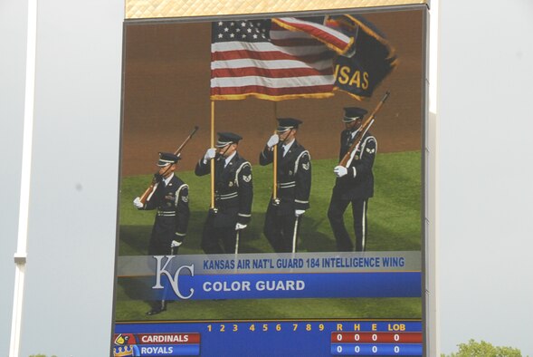 062009-F-6174J-010- (l-r) SSgt Francis Nguyen, SSgt Jason Harkness, SSgt Aaron Santry, and SrA Byron Smith present the colors at the Kansas City Royals game at Kaufman Stadium on June 20, 2009. Video of the 184th Intelligence Wing Honor Guard was shown on the jumbo-tron for the entire stadium to see. (Photo By: SSgt Justin Jacobs)