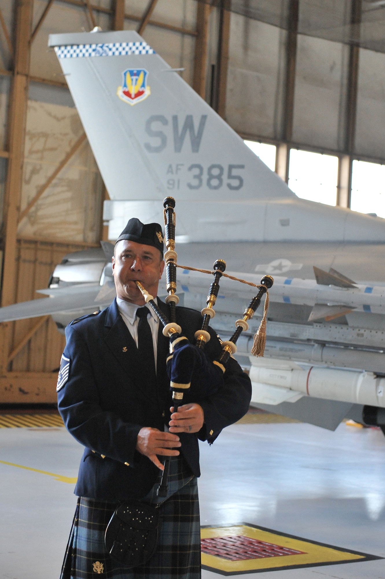 SHAW AIR FORCE BASE, S.C. -- Master Sgt. Scott Gunn, Air Force Reserve Pipe Band member, performs during the change of command ceremony of the 20th Maintenance Group, June 23. Gunn is on temporary duty assignment from Robins AFB, Ga. (U.S. Air Force photo/Senior Airman Kathrine McDowell)
