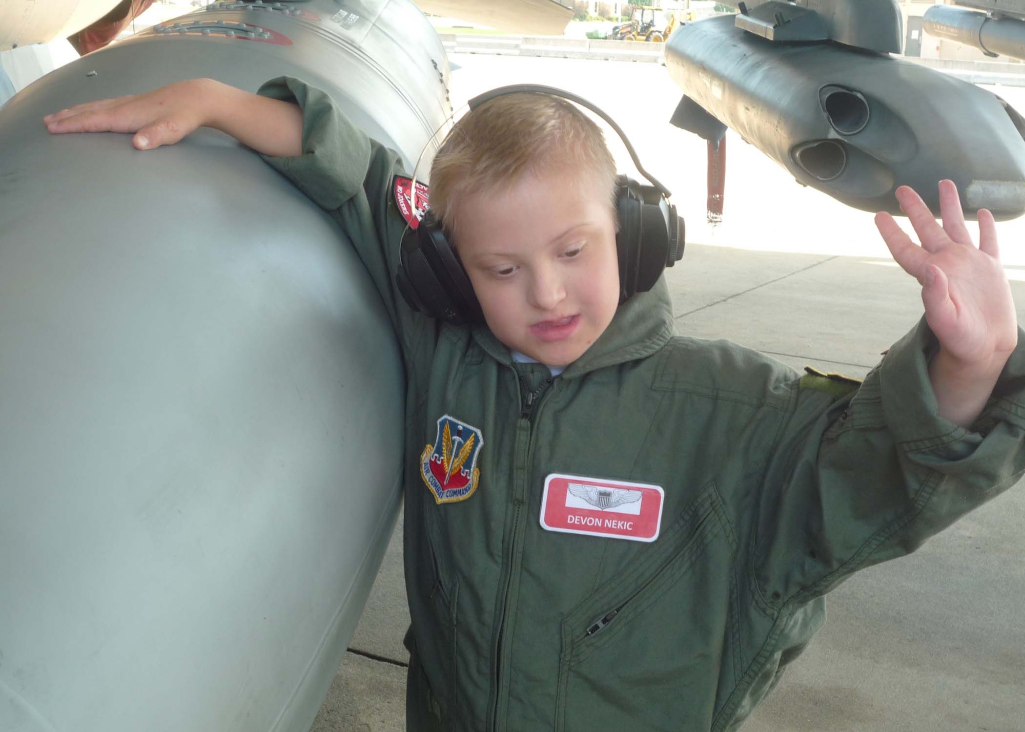 SHAW AIR FORCE BASE, S.C. - Eight-year-old Devon Nekic gets an up-close look at an F-16 fighter jet on a tour of the flightline. He became an honorary member of the 77th Fighter Squadron  during his visit to Shaw Air Force Base. (Courtesy photo)