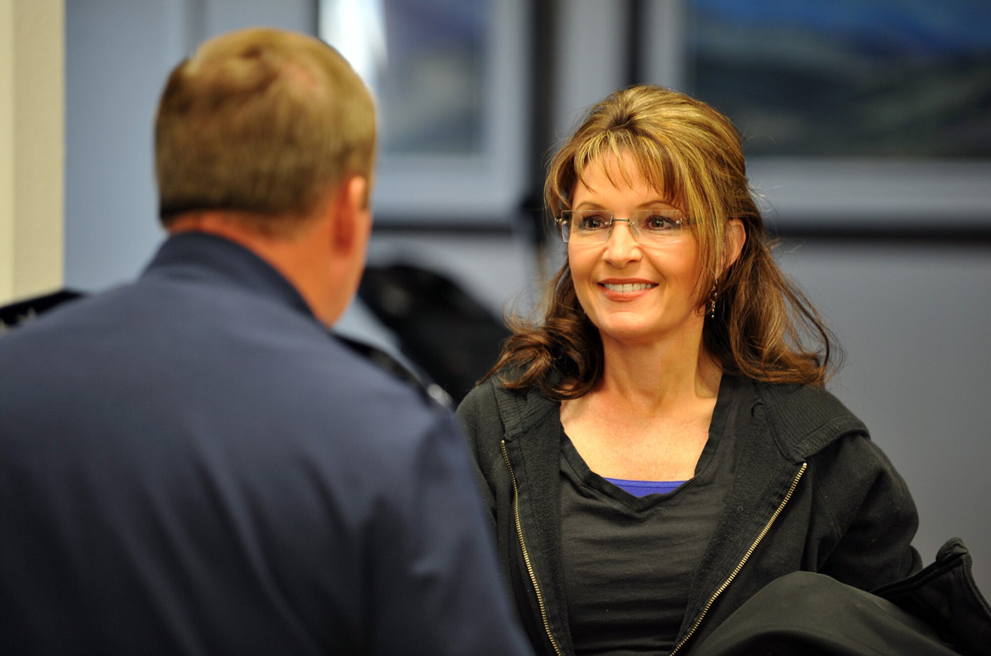 090622-F-2034C-004
Lt. Gen. Dana T. Atkins, Alaskan Command commander talk with Sarah Palin, Governor of Alaska at the passenger terminal on Elmendorf Air Force Base June 22, 2009. Gov. Palin is visiting the base to get a safety briefing before heading out to the USS John C. Stennis (CVN 74) for a distinguished visitor tour during Exercise Northern Edge 09. Northern Edge is Alaska?s largest military training exercise that prepares joint forces to respond to crises throughout the Asia-Pacific region. (U.S. Air Force photo/ MSgt Shane A. Cuomo) RELEASED
