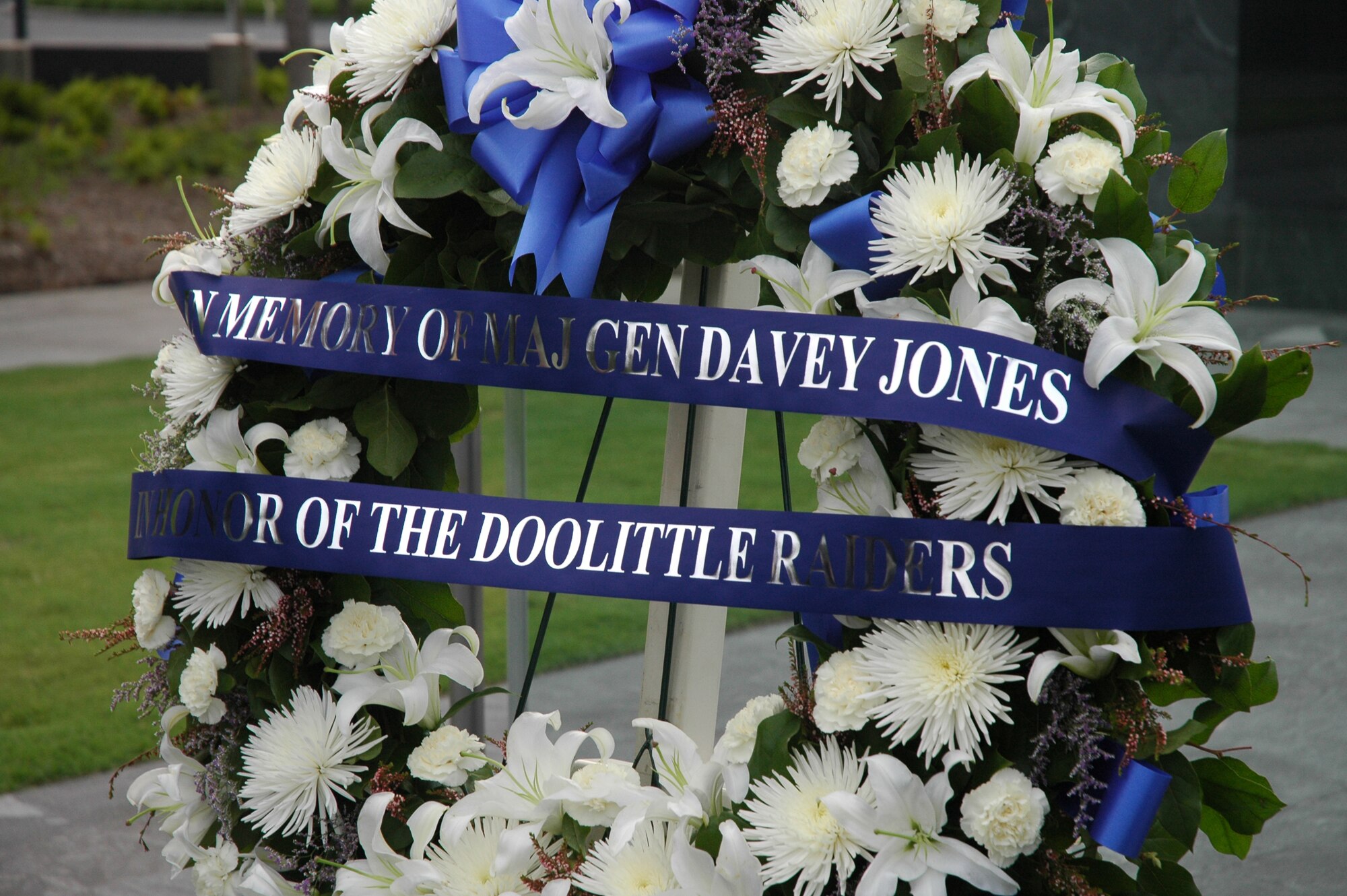 A wreath was laid near the Missing Man Wall at the U.S. Air Force Memorial in Arlington, Va., June 19 to honor Maj. Gen. David Jones, part of the historic Doolittle Raiders and a former prisoner of war, who was buried at Arlington National Cemetery earlier that day. (U.S. Air Force photo by Senior Airman R. Michael Longoria)