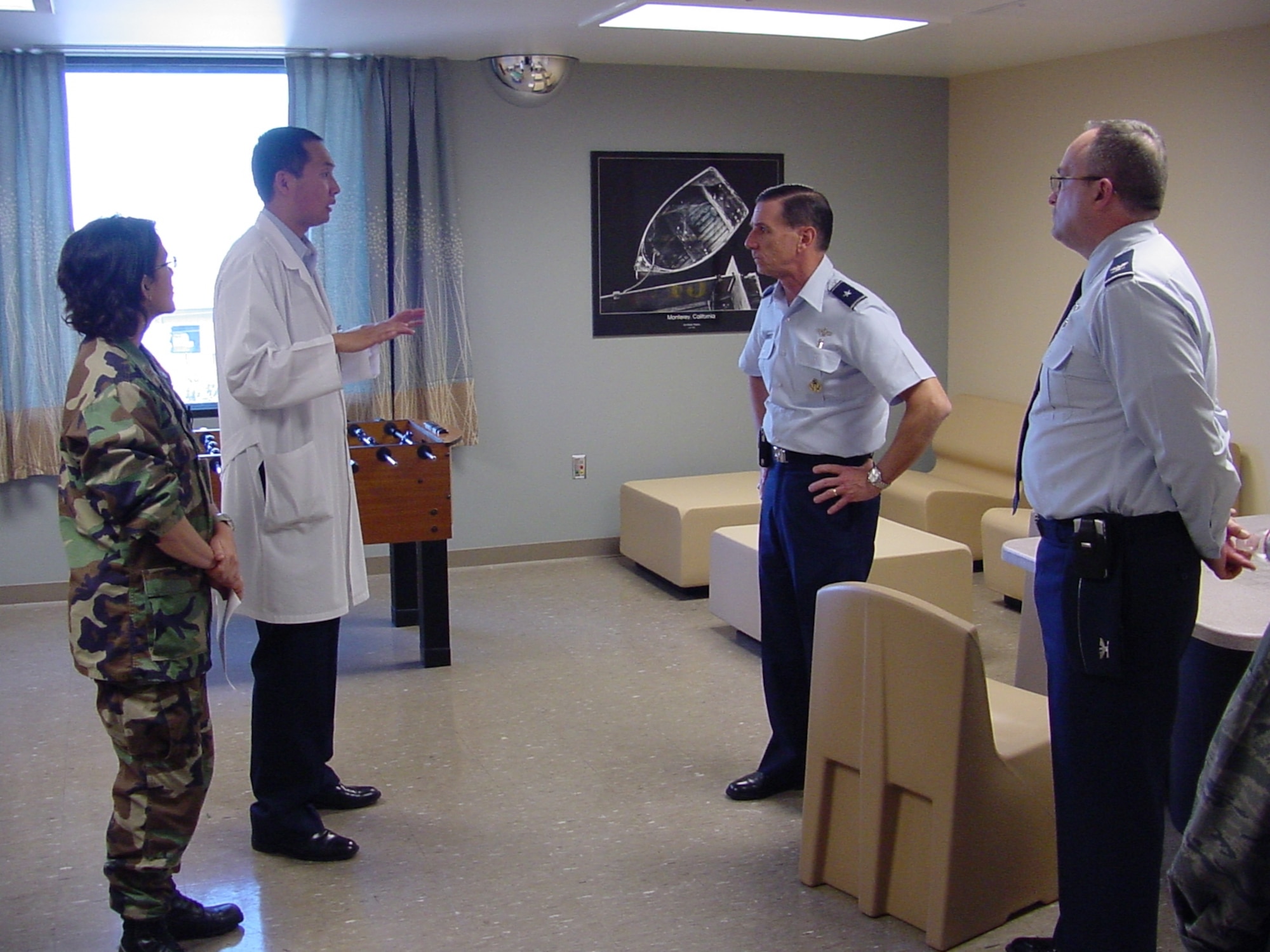 Maj. (Dr.) Vu Le, 60th Medical Operations Squadron medical director of the Joint Inpatient Mental Health Unit and Maj. Susan Von Eicken, 60th Inpatient Squadron nurse, brief Brig. Gen. (Dr.) Byron C. Hepburn, Air Force Medical Support Agency commander and Col. (Dr.) Lee E. Payne,  60th Medical Group commander on the new DoD/VA Joint Inpatient Mental Health Unit at David Grant USAF Medical Center.  General Hepburn, a former 60th Medical Group commander, has recently been selected to be deputy Surgeon General for the Air Force.  (U.S. Air Force photo / Jim Spellman)