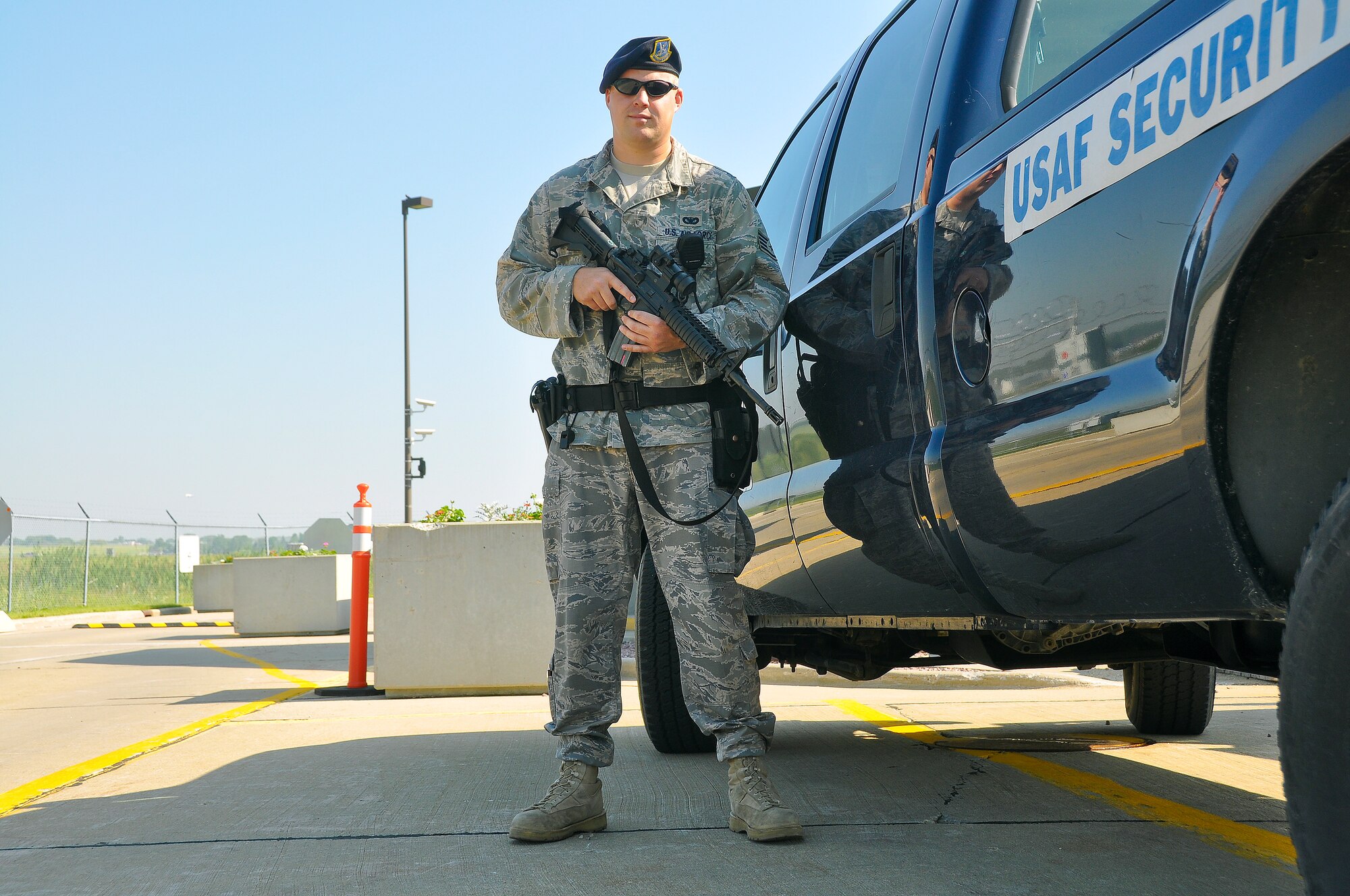 Staff Sgt. Brian Wunder, a 128 Air Refueling Wing Security Forces Squadron team member, stands guard at the base main gate Tuesday, June 23, 2009.  Wunder was one of 32 SFS Airmen from the 128th deployed to Bagram Air Base, Afghanistan, earlier this year.  (U.S. Air Force photo by Senior Airman Ryan Kuntze)