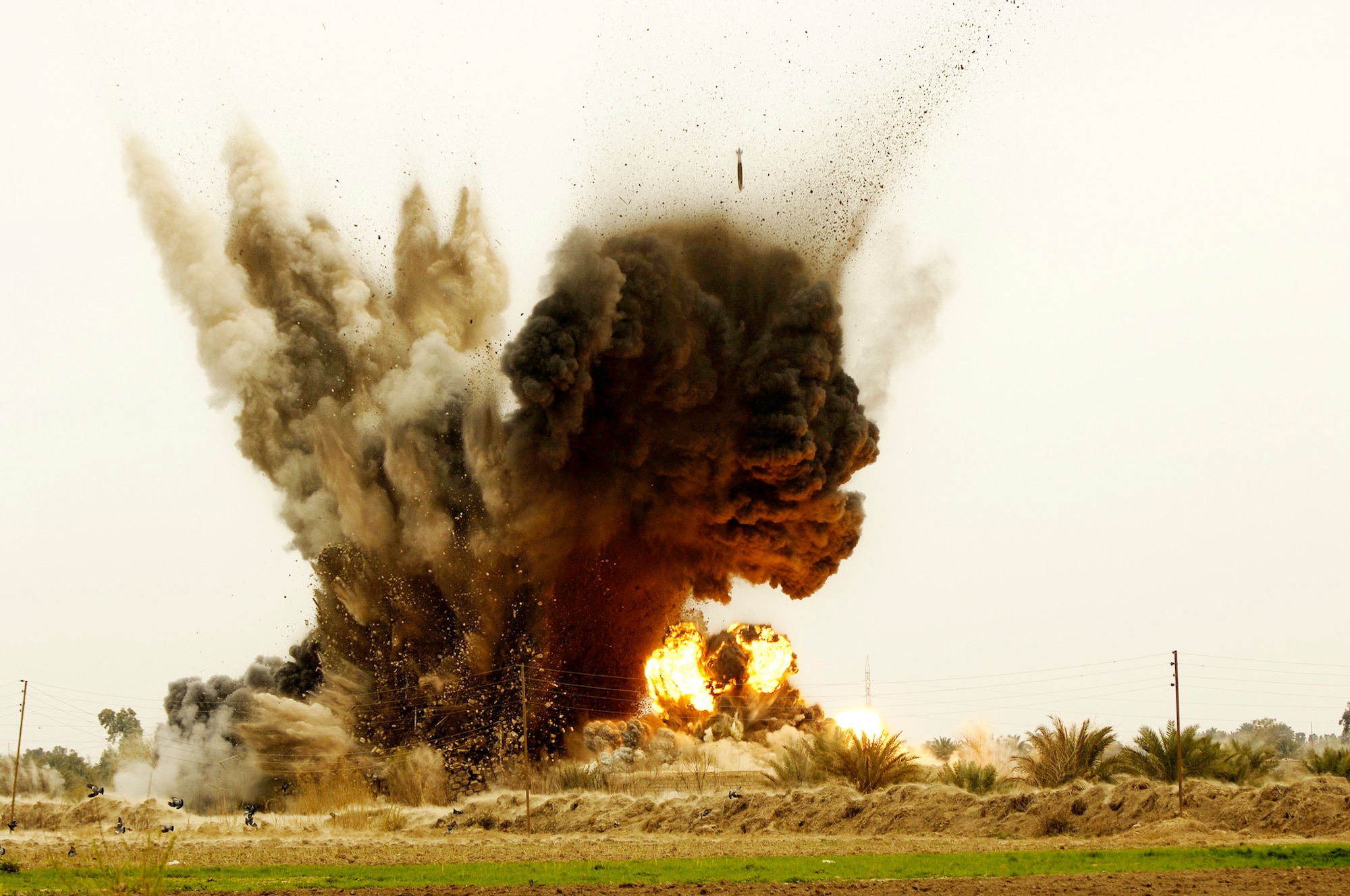 Six guided bomb units dropped from a B-1B Lancer and cleared by Senior Airman Joseph Aton strike an al-Qaida torture house and prison in 2008 in northern Zambraniyah, Iraq. (U.S. Air Force photo/Master Sgt. Andy Dunaway) 
