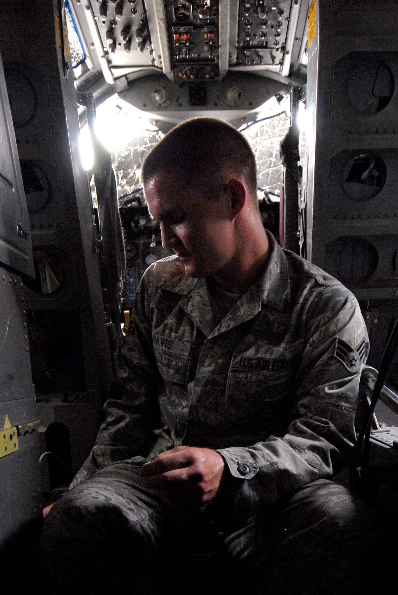 Senior Airman Zachary Davis, a 379th Expeditionary Maintenance Squadron aircrew egress systems journeyman, uses a pre-measured bolt to check the bellows depth for the seat carrier retract thrusters during his inspection on the ejection seat of a B1-B Lancer, June 18, 2009, at an undisclosed location in Southwest Asia.  The seat retract thruster is a system that will reposition the seat during an ejection.  The ejection system is inspected to ensure the pilots can safely eject out the aircraft in an emergency where the plane is in a terminal condition.  The system can launch a 300 lb. individual 200 feet in the air and deploy a parachute in 1.8 seconds.  Airman Davis hails from San Andreas, Calif. and is deployed from Dyess Air Force Base, Texas, in support of Operations Iraqi and Enduring Freedom and Combined Joint Task Force - Horn of Africa.  (U.S. Air Force photo/Senior Airman Andrew Satran/released)