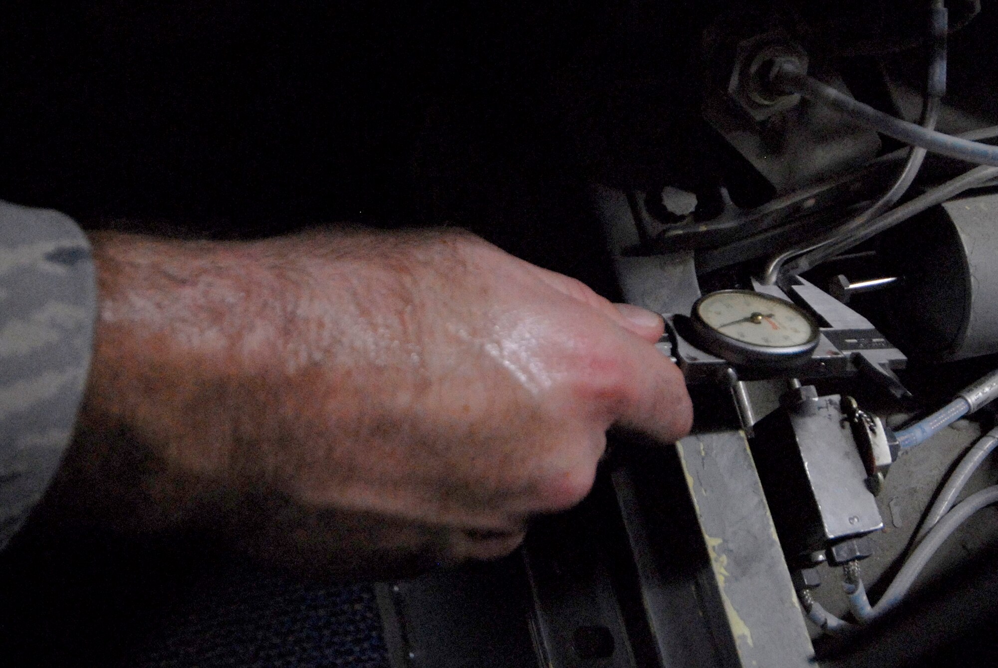 Staff Sgt. Christopher Mosley, 379th Expeditionary Maintenance Squadron aircrew egress systems section chief, inspects the seat carrier retract thrusters during his inspection on the ejection seat of a B1-B Lancer, June 18, 2009, at an undisclosed location in Southwest Asia.  The seat retract thruster is a system that will reposition the seat during an ejection.  The ejection system is inspected to ensure the pilots can safely eject out the aircraft in an emergency where the plane is in a terminal condition.  The system can launch a 300 lb. individual 200 feet in the air and deploy a parachute in 1.8 seconds.  Sergeant Mosley hails from Savannah, Ga. and is deployed from Dyess Air Force Base, Texas, in support of Operations Iraqi and Enduring Freedom and Combined Joint Task Force - Horn of Africa.  (U.S. Air Force photo/Senior Airman Andrew Satran/released)