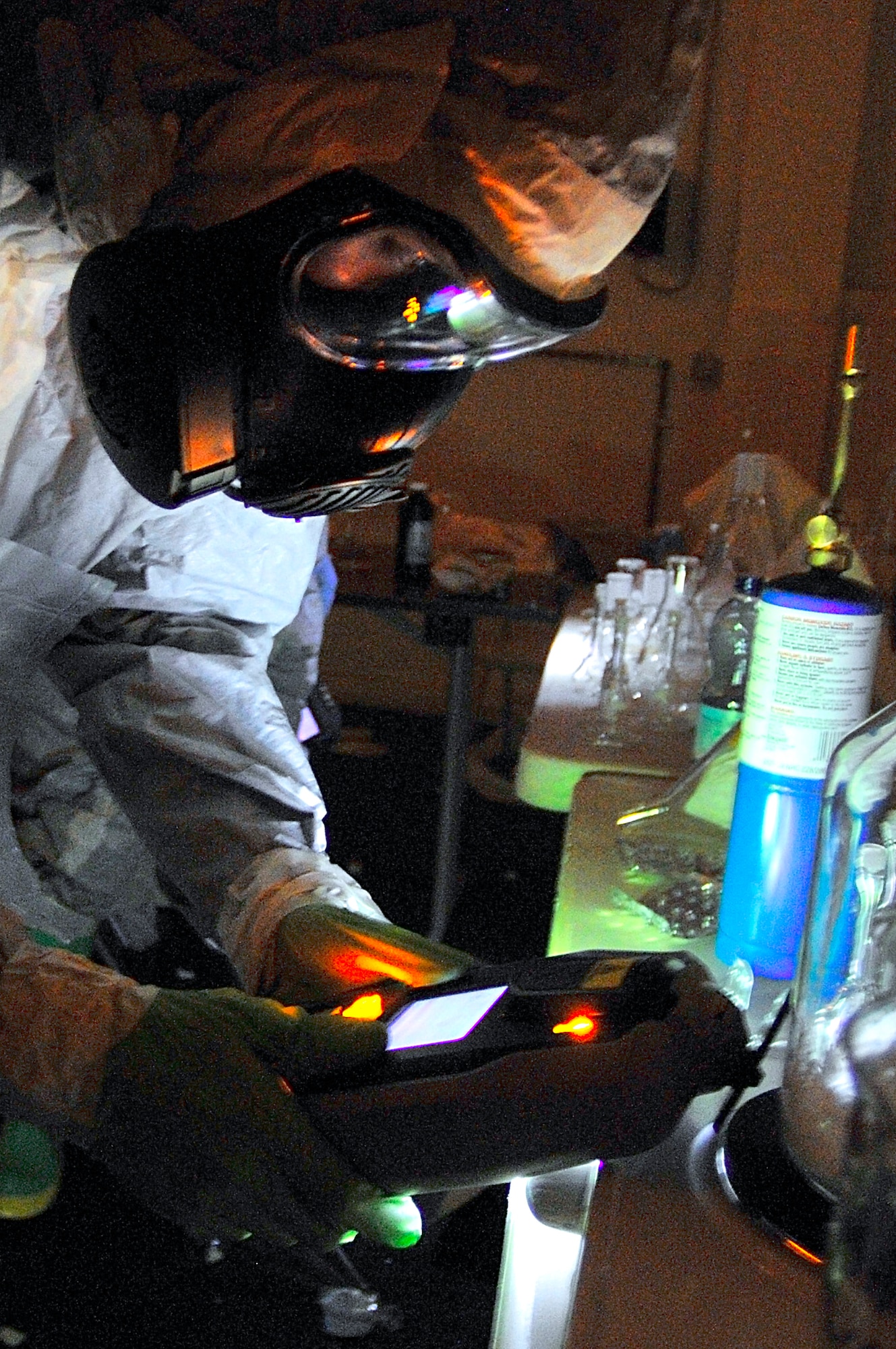 U.S. Air Force Staff Sgt. Joshua McDowell, 52nd Civil Engineer Squadron emergency manager, tests chemicals in a simulated emergency environment during the U.S.  Air Forces in Europe chemical, biological, radiological and nuclear challenge, Ramstein Air Base, Germany,  June 23, 2009. (U.S. Air Force photo by Staff Sgt. Stephen J. Otero)