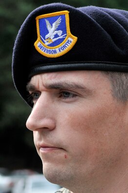 U.S. Air Force Master Sgt. Matther Walter, 569th U.S. Forces Police Squadron patrolman, participates in a ceremony on Vogelweh Military Complex, Germany, June 19, 2009. The ceremony was held to honor another 569th member, Erik Hite, a police officer from Tucson, Ariz., who was injured about a year ago in the line of duty and died a few days later. (U.S. Air Force photo by Staff Sgt. Stephen J. Otero)