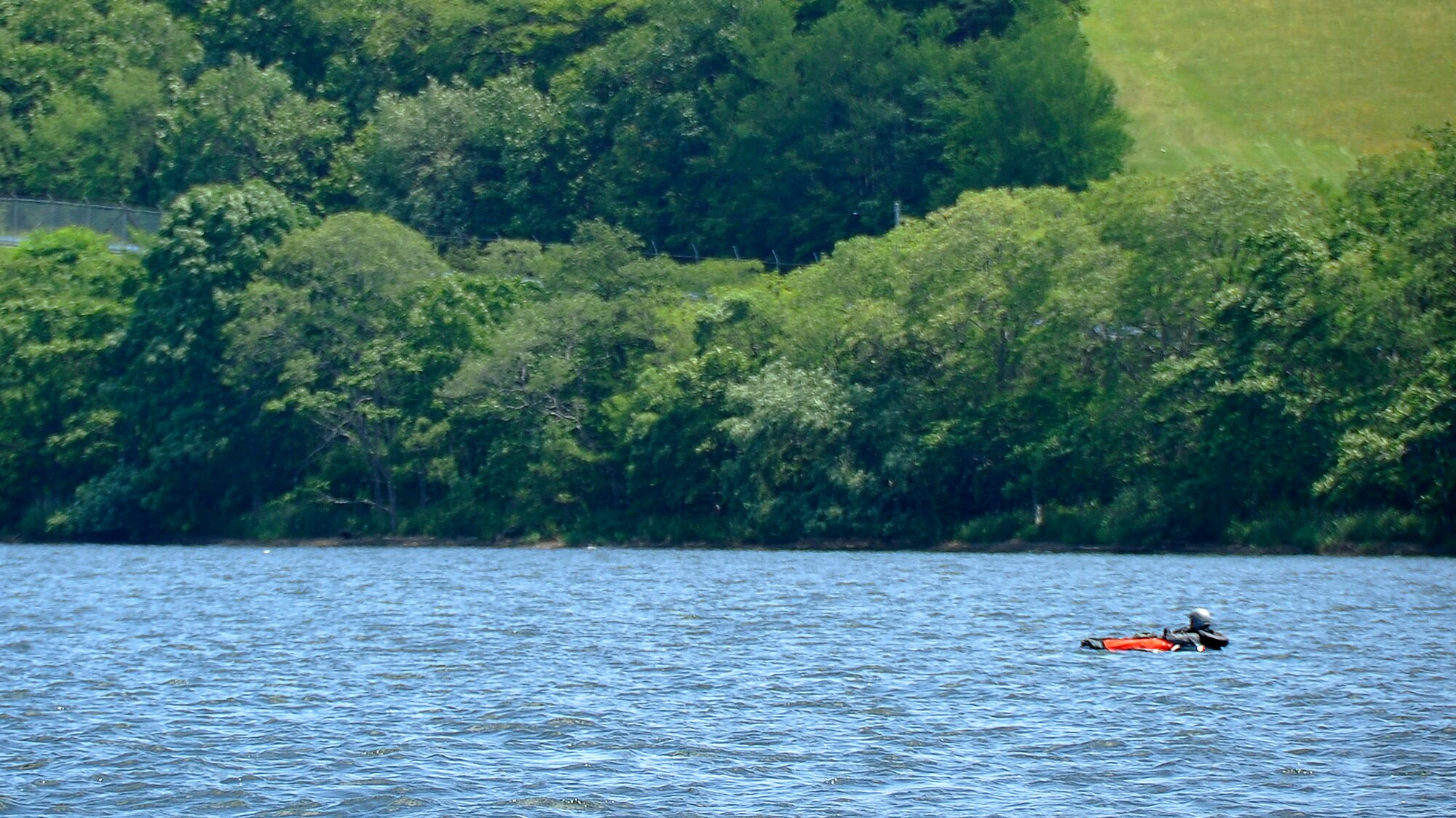 MISAWA AIR BASE, Japan -- Maj. Wesley Hales, 13th Fighter Squadron pilot, awaits  rescue during water survival training at Lake Ogawara June 24, 2009.  Water survival training is taught by Survival, Evasion, Resistance and Escape specialists annually. (U.S. Air Force photo by Senior Airman Chad C. Strohmeyer)