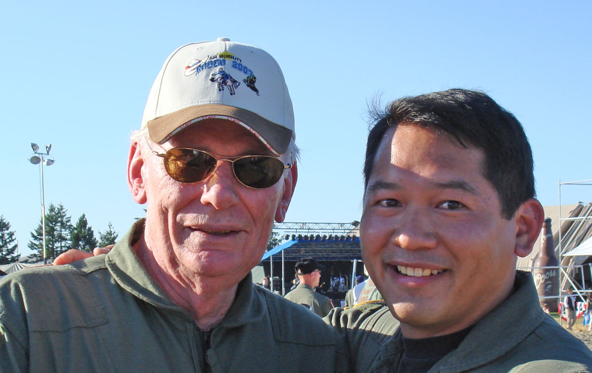 Maj. Mike Bautista (right), a pilot form the 728th Airlift Squadron, and Herb Kelleher, founder and former president, CEO and chairman of the board of Southwest Airlines, pose for a photo at Rodeo 2007. Major Bautista was awarded the 2009 Air Force Reserve Citizen Airman of the Year Award, and his employer, Southwest Airlines, won the 2009 Employer of the Year Award. 