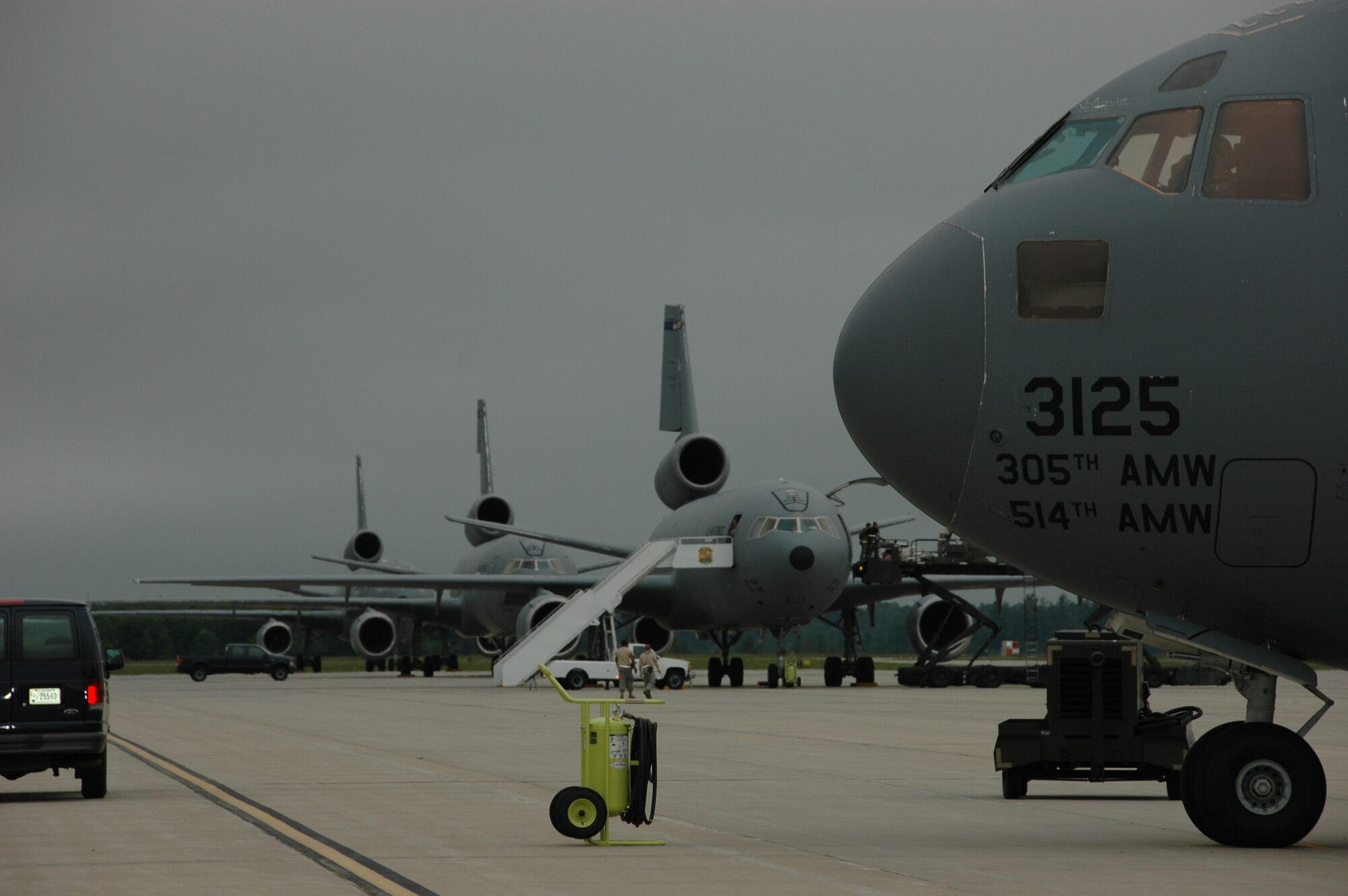 During a weeklong series of tests to validate their war time readiness, capability and compliance, McGuire's KC-10 Extenders stand ready for action. (U.S. Air Force photo/Master Sgt. Charles Kramer)