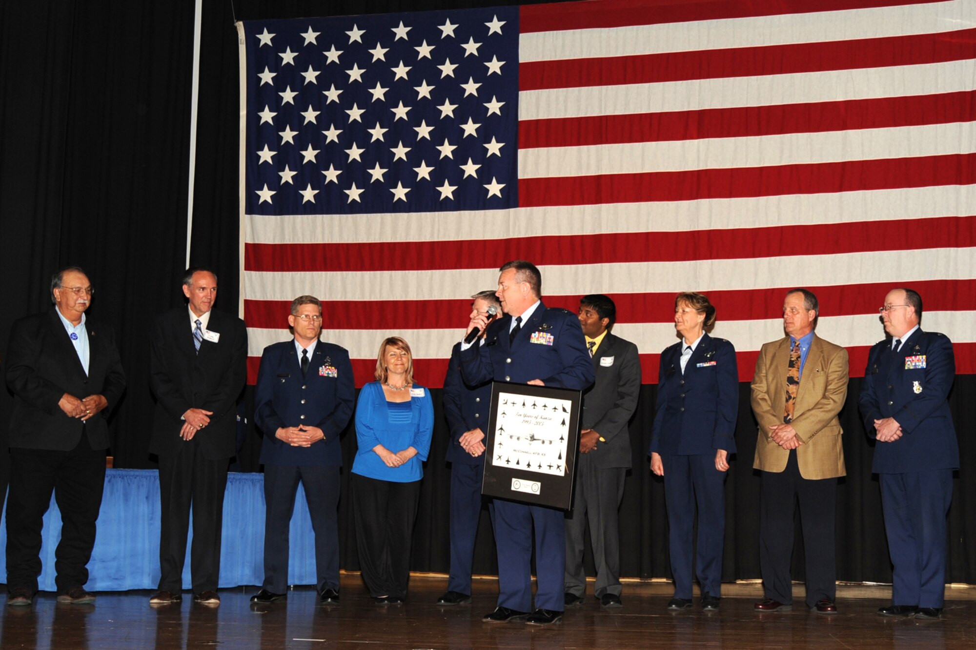 Col. Edsel A. "Archie" Frye. Jr. speaks during an honorary commander induction ceremony at McConnell Air Force Base, Kan. Colonel Frye welcomed five civilian leaders from the McConnell community as the 931st Air Refueling Group's inaugural group of honorary commanders. Colonel Frye is the commander of the 931st, an Air Force Reserve unit at McConnnell. (U.S. Air Force photo/Airman 1st Class Maria Ruiz)