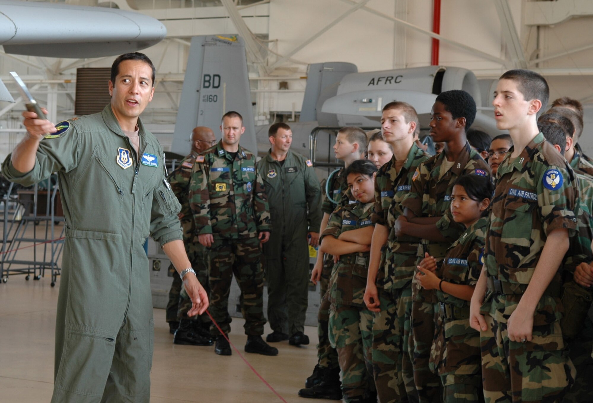 Major Aristotle Rabanal, 47th Fighter Squadron Scheduler shows the A-10 aircraft to about 80 cadets from Louisiana and Texas during the 2009 Civil Air Patrol Encampment at Barksdale AFB, La, June 18 – 28. (Photo by Mrs. Betty Stephens/917th Public Affairs Office)