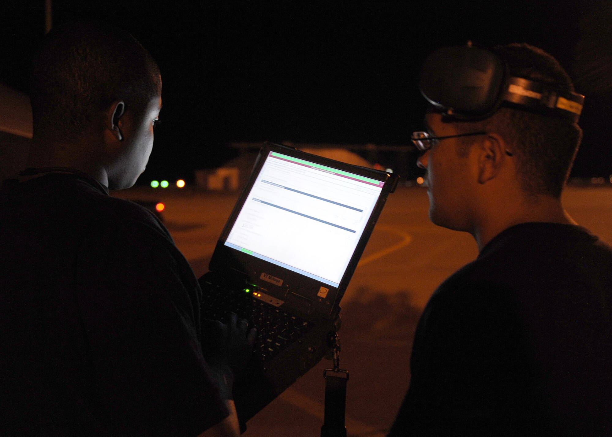 Staff Sgt. Ernest Fishburne and Senior Airman Toby Hernandez, 49th Aircraft Maintenance Squadron assess the weapons load of an F-22A Raptor, during the Weapons System Evaluation Program (WSEP), Holloman Air Force Base, N.M., June 24. Many Air Force fighter aircraft are participating in this evaluation. (U.S. Air Force photo/Senior Airman Michael Means)