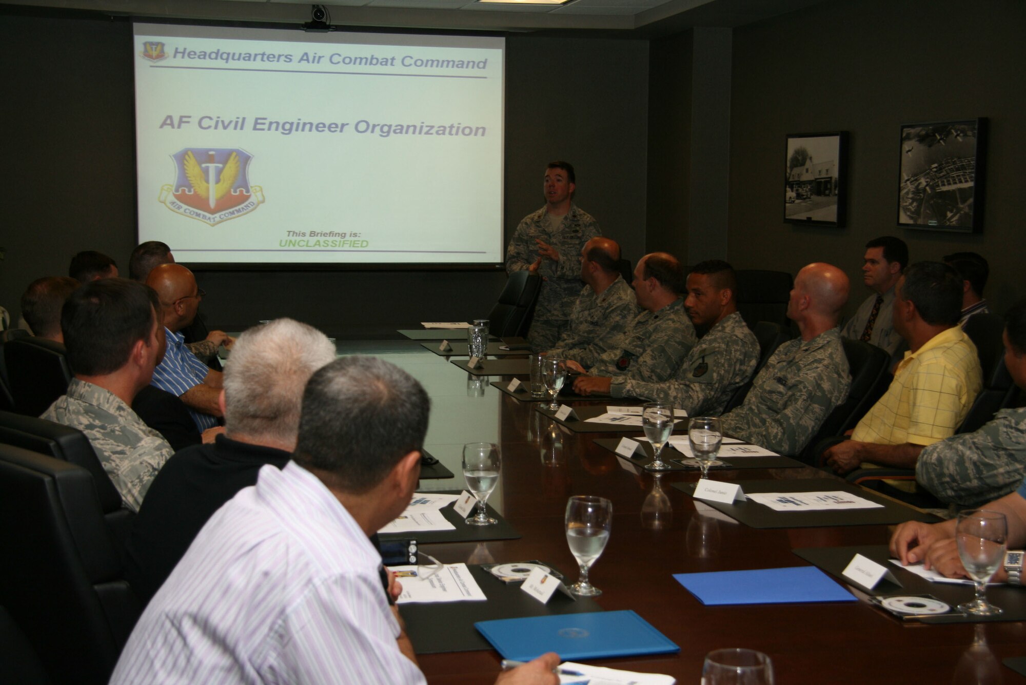 Major Matthew Craig, ACC Operations Support Branch Chief, briefs senior leaders on how the ACC accomplishes Civil Engineering installation management and support on Jun. 10, 2009 at Langley Air Force Base, Virginia. The Iraqi Security Forces Senior Engineer Symposium showcased how the U.S. Military conducts facilities engineering and management in order to empower Iraqi senior engineers to design, develop and execute their own plans for aiding Iraq's expanding military abilities.