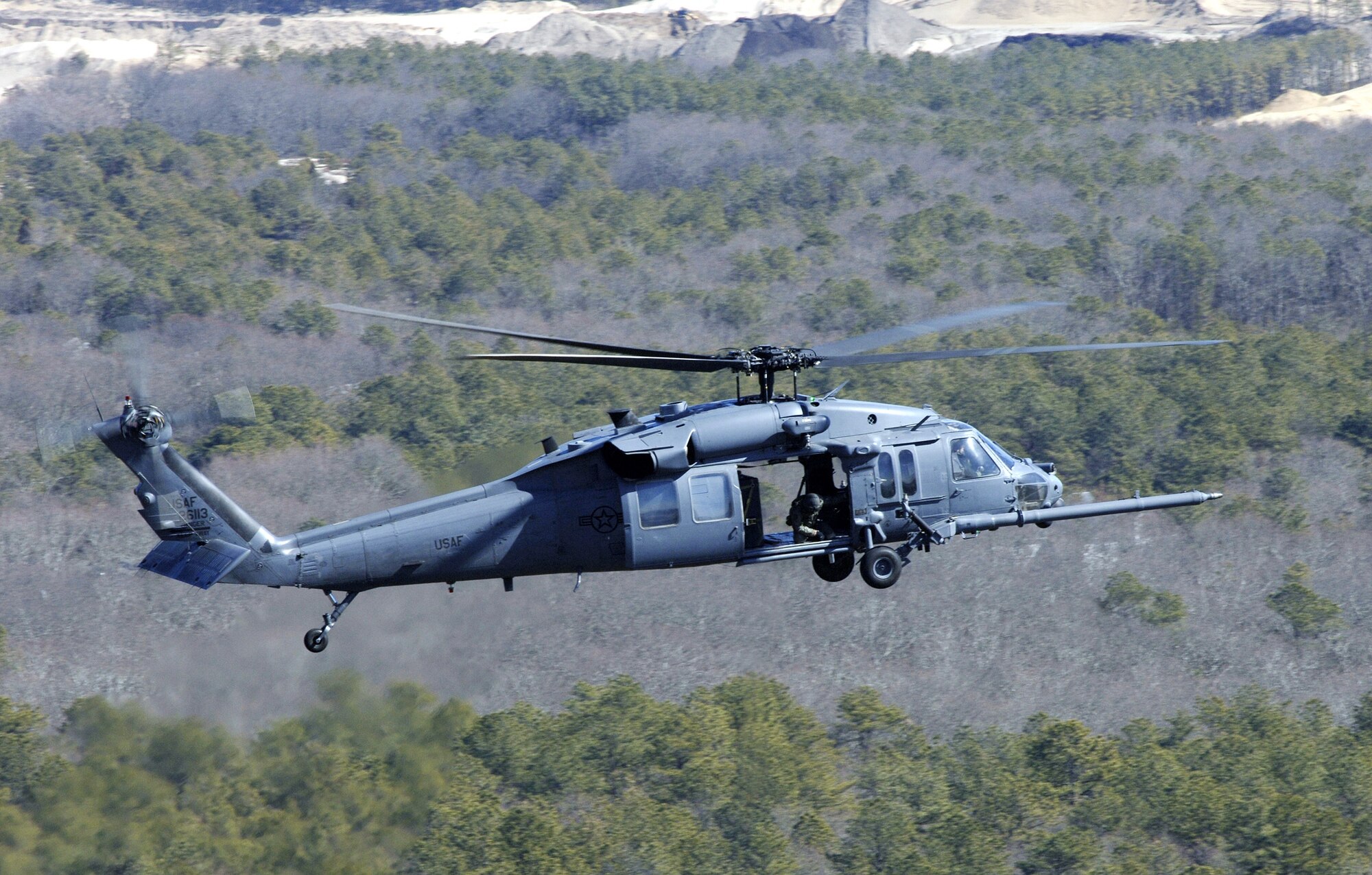 HH-60G Pave Hawk helicopters conduct day or night operations to support medical evacuations in Southwest Asia. On June 22, HH-60Gs and Guardian Angel teams transported seven patients to coalition field hospitals from locations in Afghanistan.  (U.S. Air Force photo/Master Sgt Jack Braden)