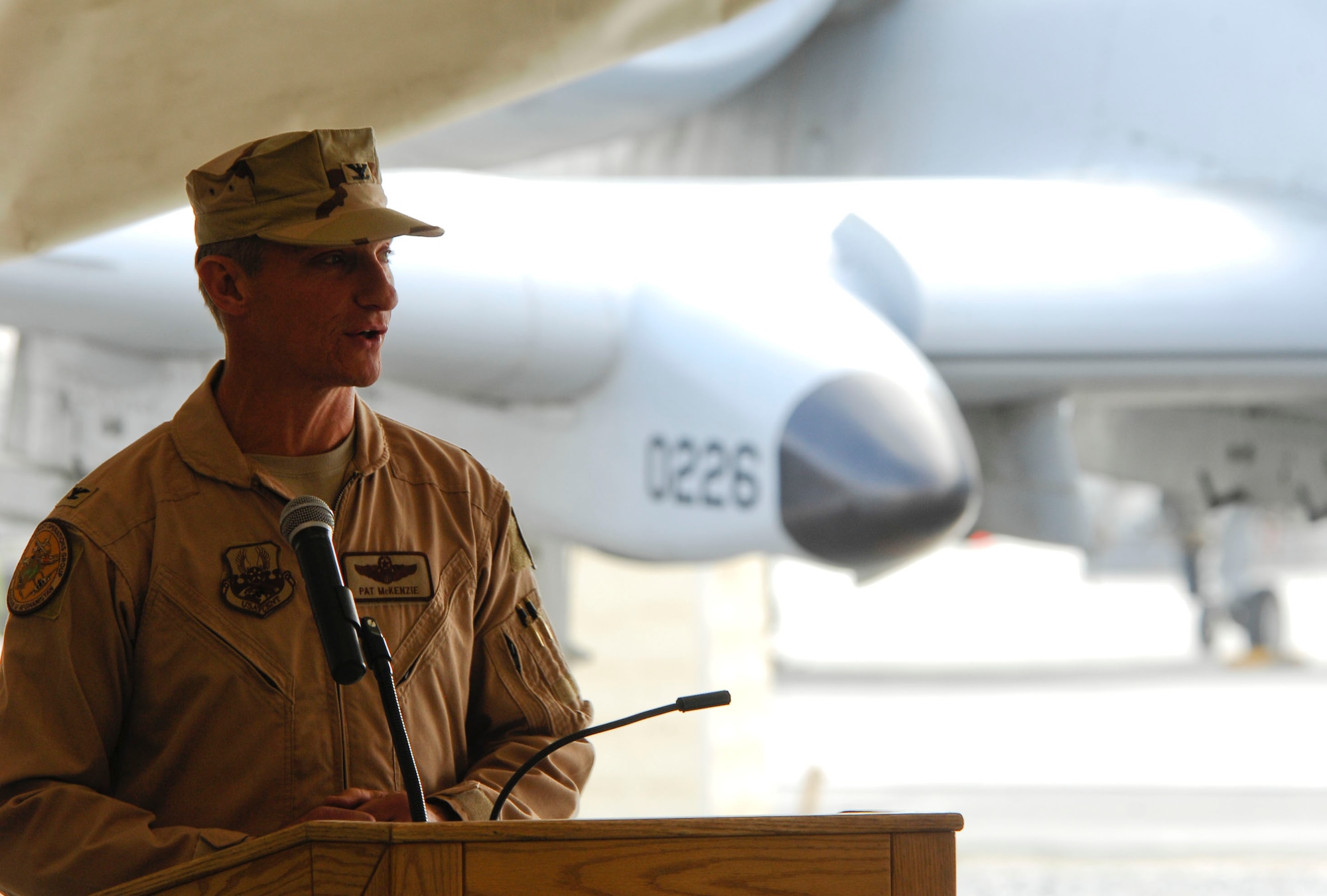 BAGRAM AIR FIELD, Afghanistan - Col. Patrick McKenzie, 455th Expeditionary Operations Group commander, delivers his first address to his Airmen shortly after taking command June 18. ?I demand that you remain brilliant in the basics of your craft and disciplined in the manner in which you execute,? said Colonel McKenzie. (U.S. Air Force photo/Senior Airman Erik Cardenas)